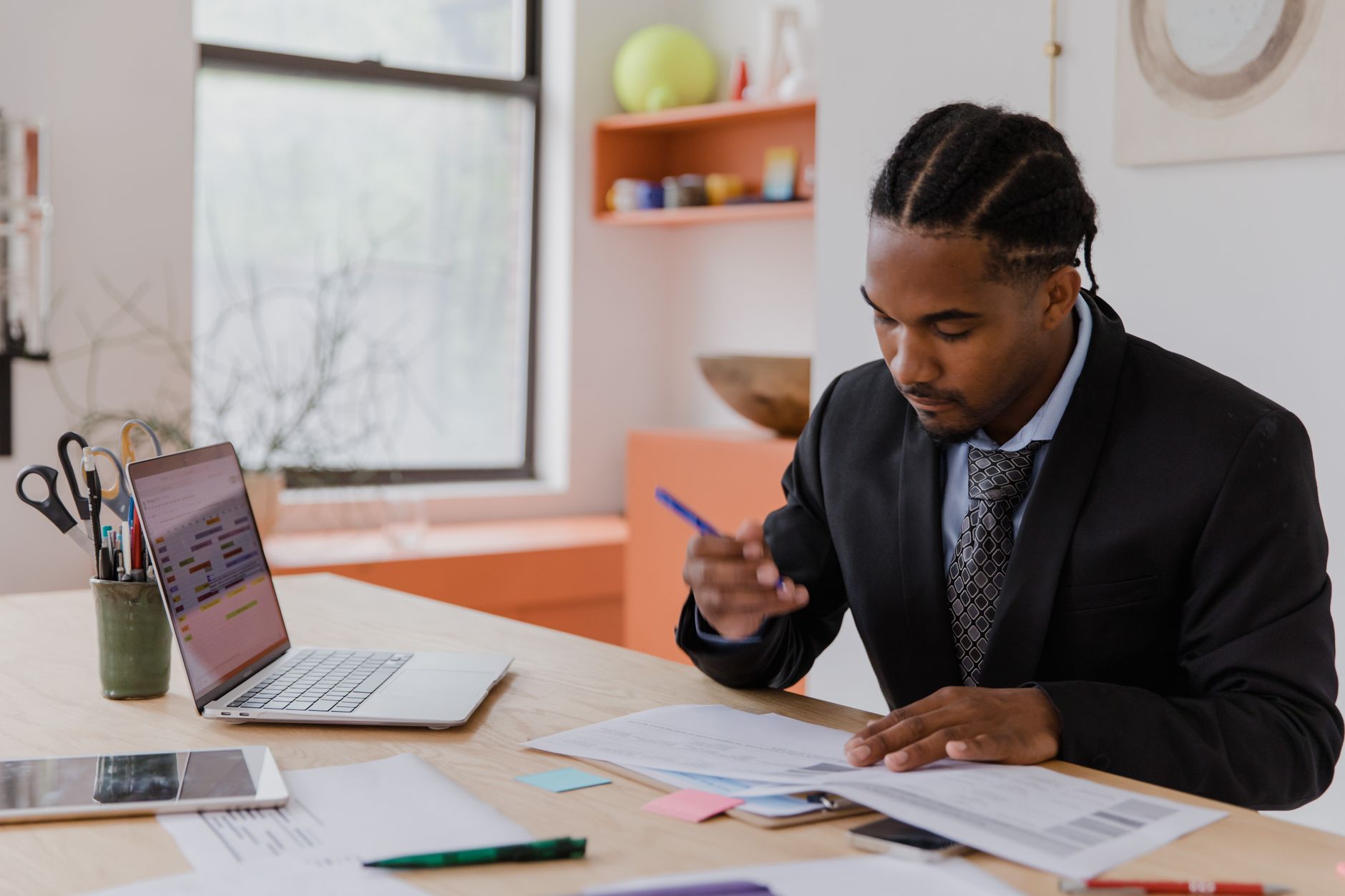A small business owner reviewing marketing content before it goes out