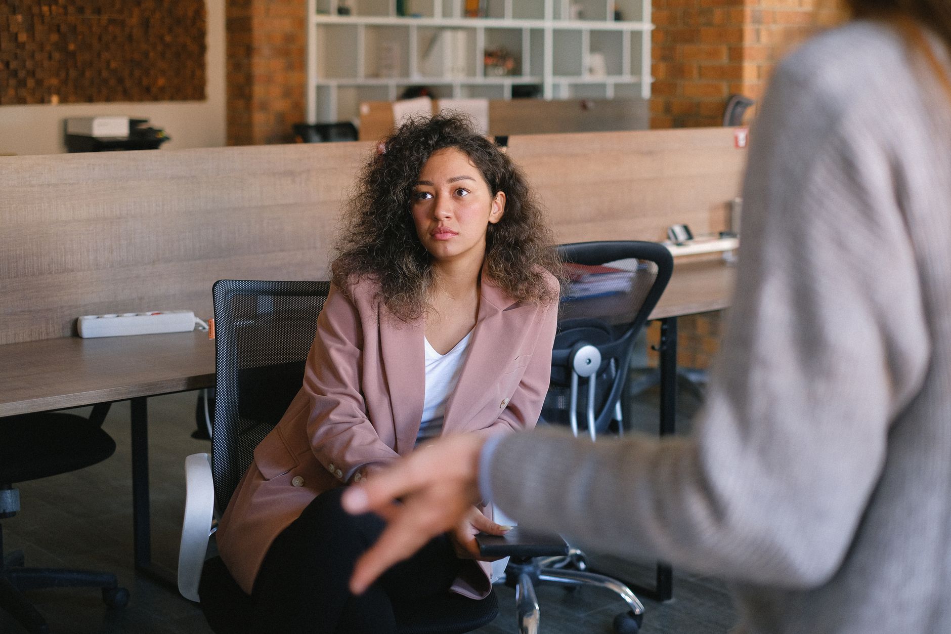 A SaaS founder explaining her product's positioning to a colleague