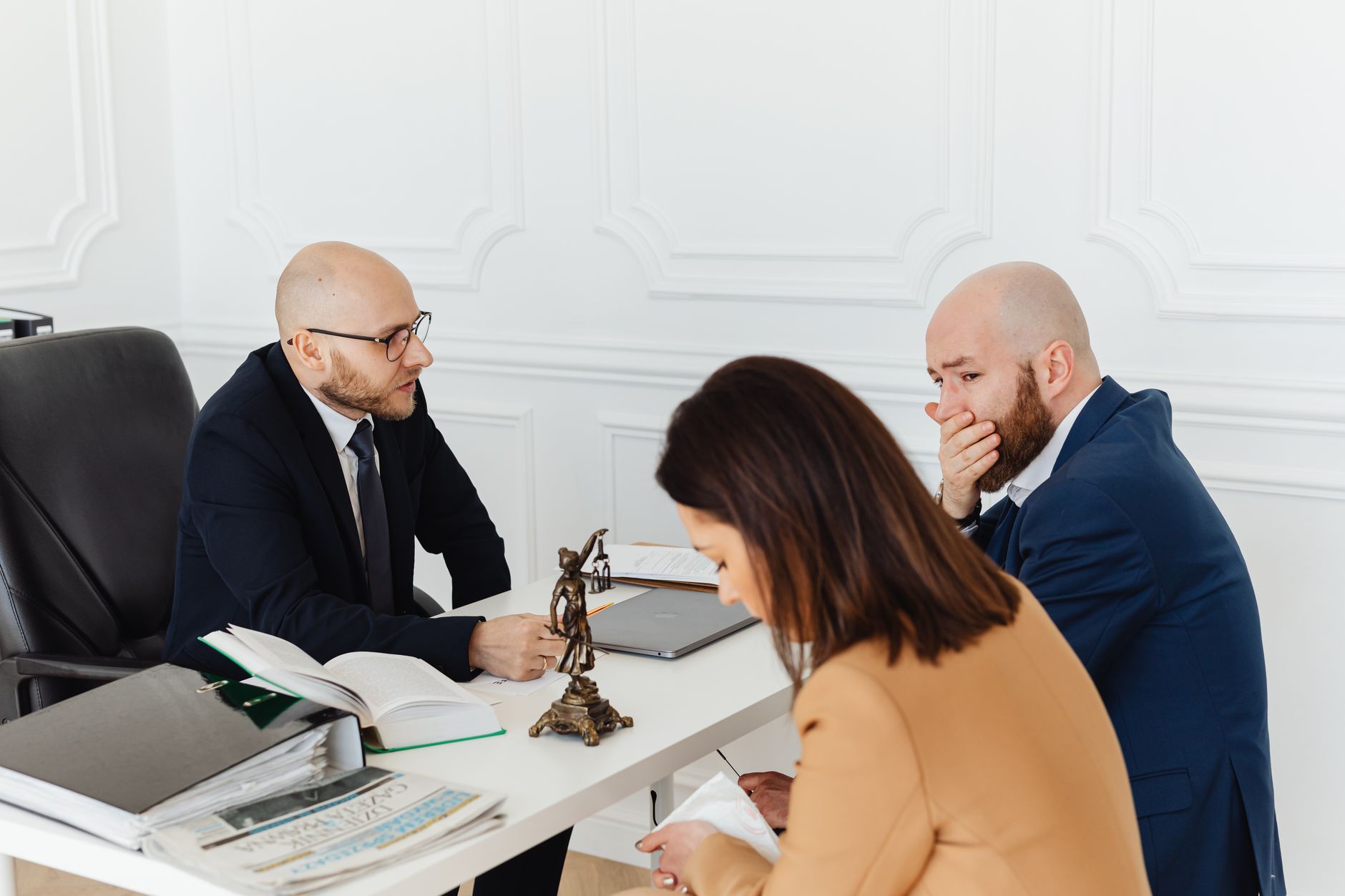 A solicitor meeting a client in a small high street law firm