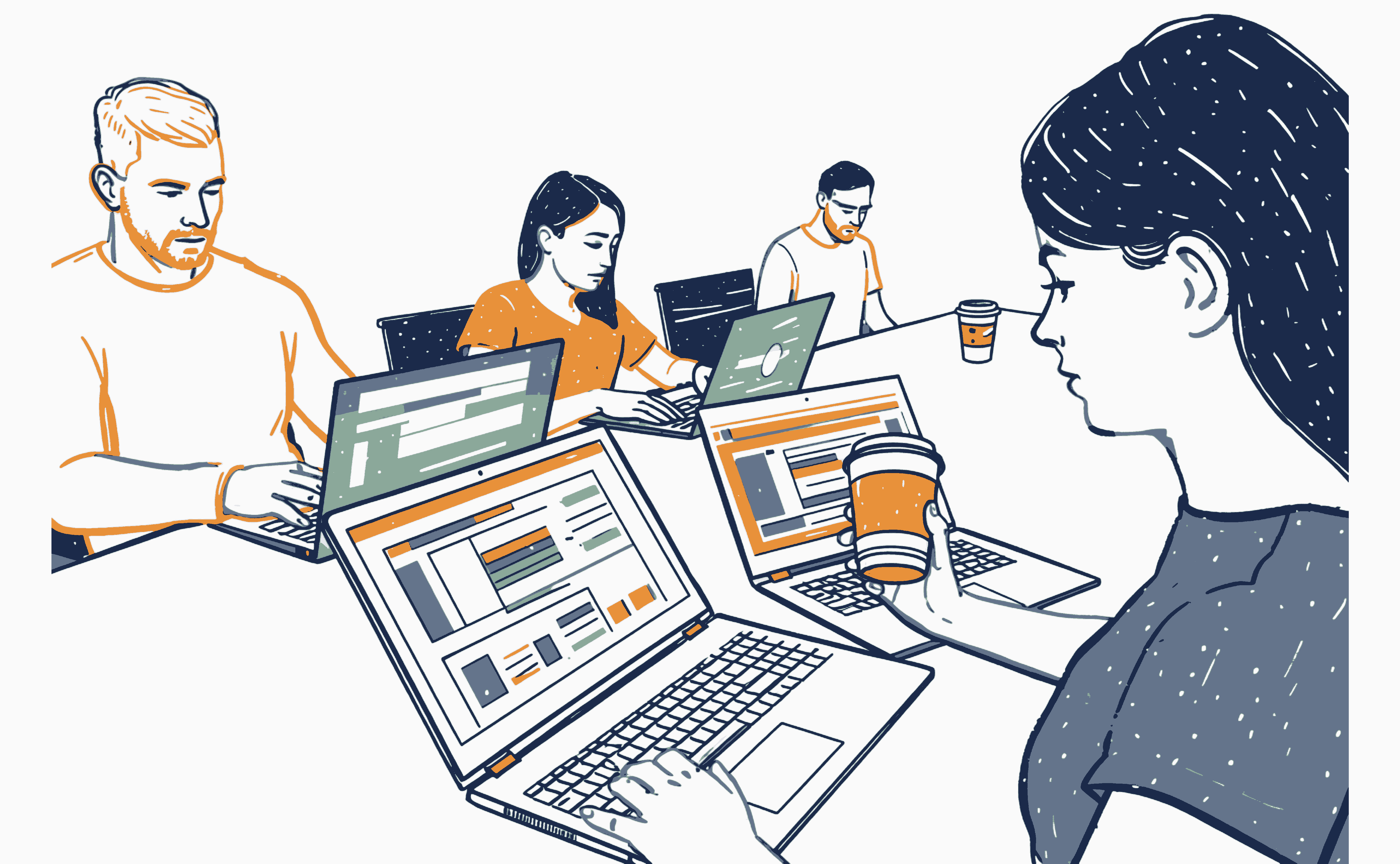A small team working together at laptops around a table.