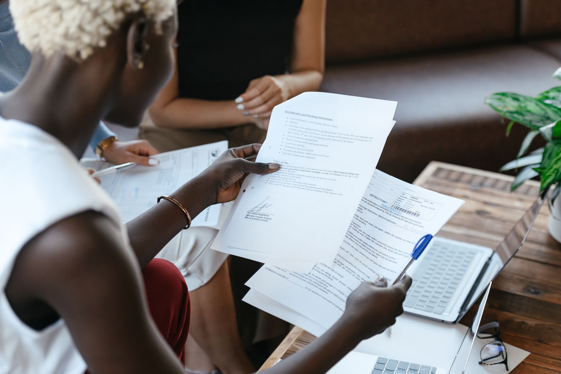 A small business owner comparing two versions of a flyer before choosing one