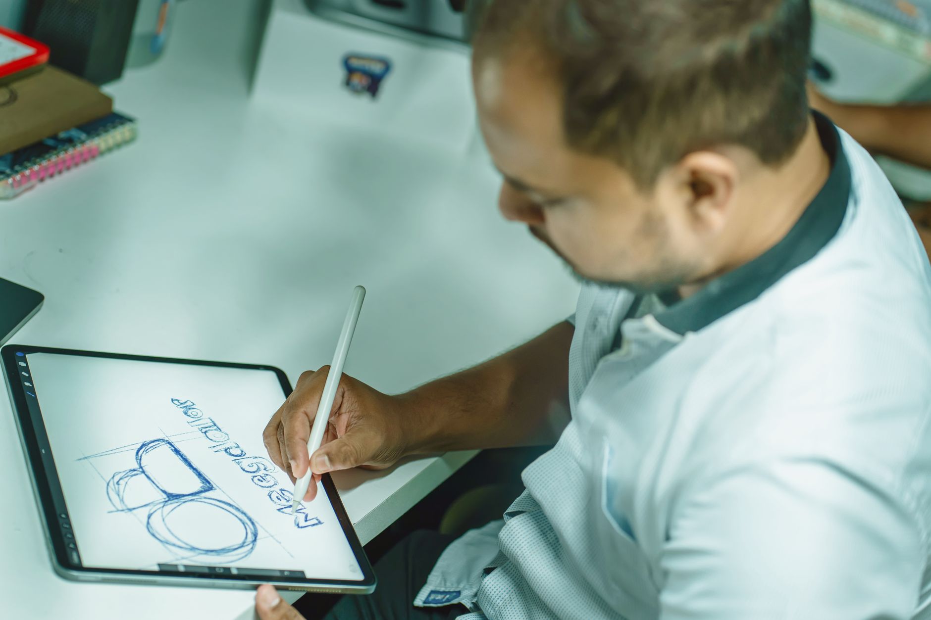 A graphic designer working through positioning with a client