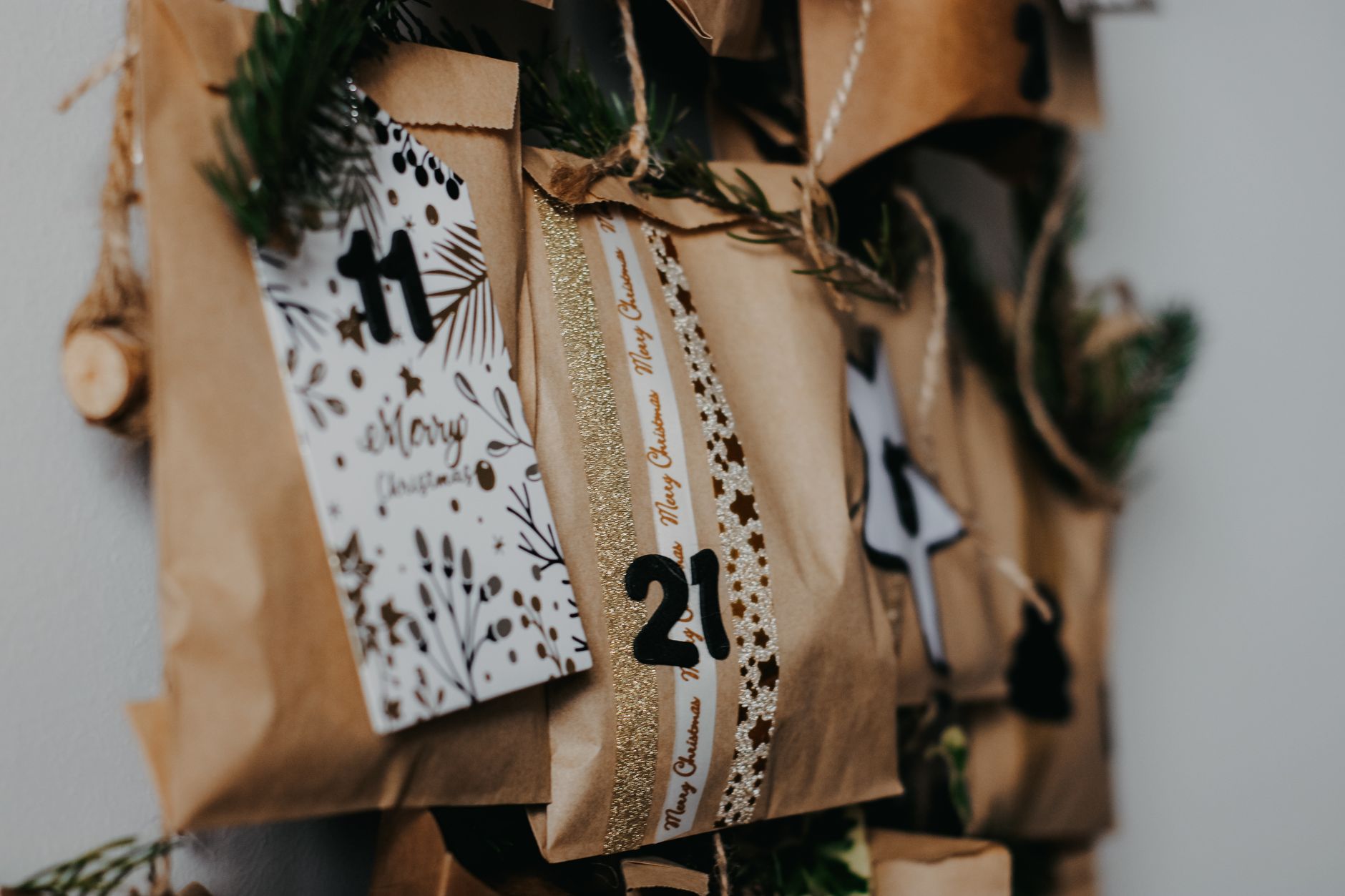 A customer opening a daily door on an advent calendar
