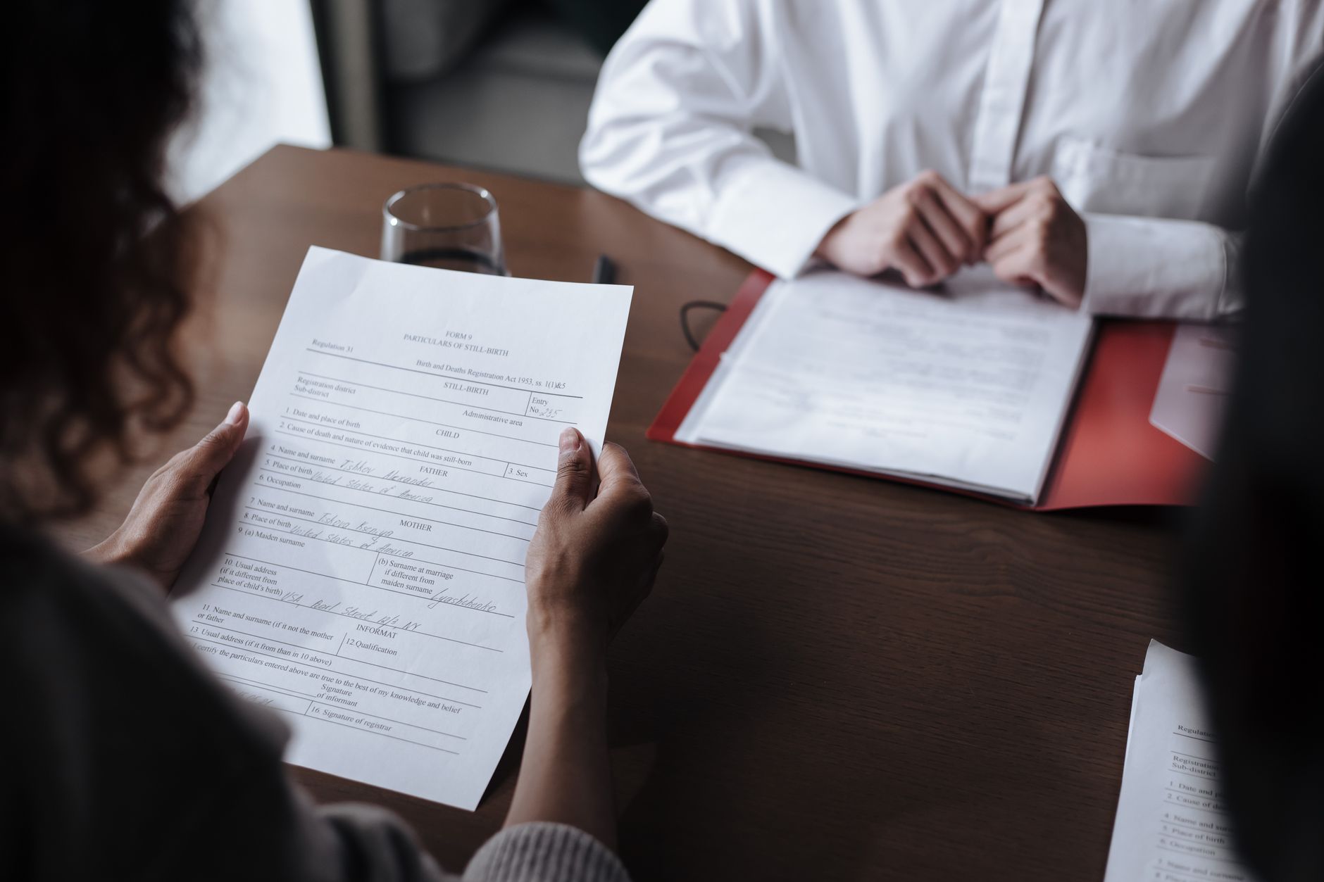A shop owner checking the terms of an affiliate agreement