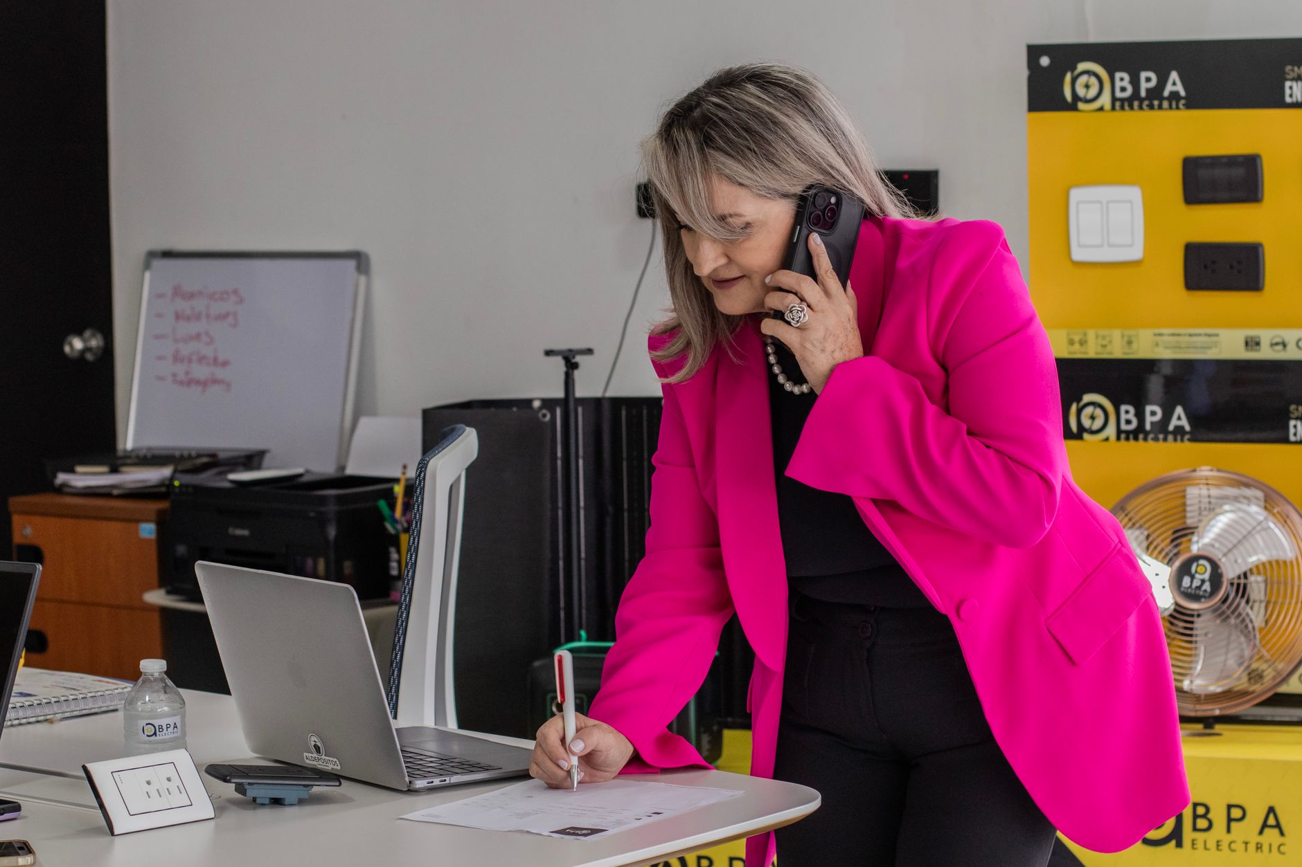 A business owner double checking automated replies for accuracy
