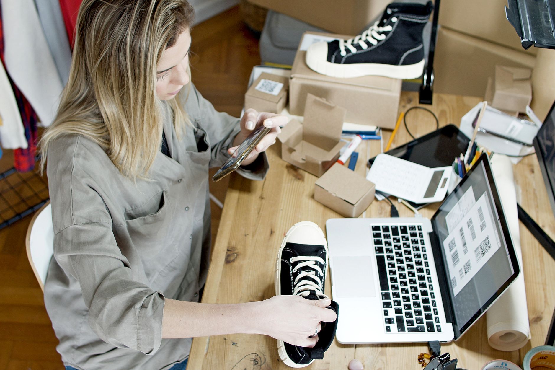 A shop owner keeping their brand voice consistent online