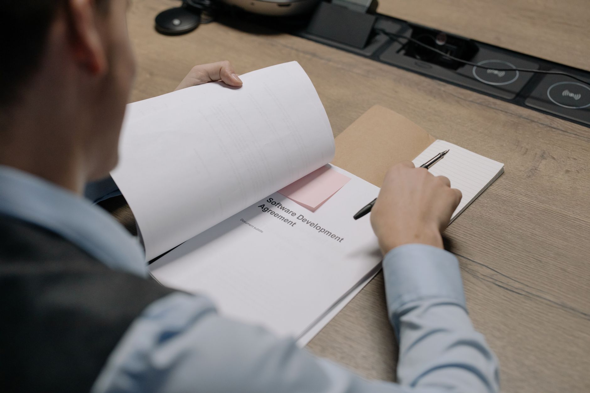 A software company founder reviewing a draft of marketing copy
