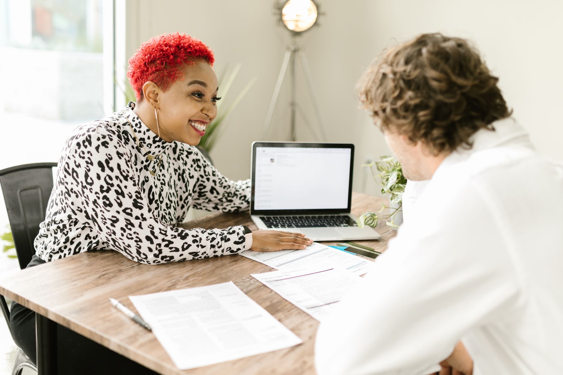 An accountant listening to a client's real story in a meeting