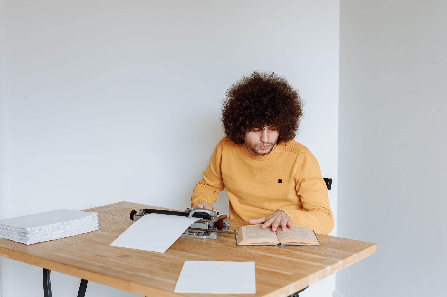 A business owner reading a draft aloud to check it sounds right