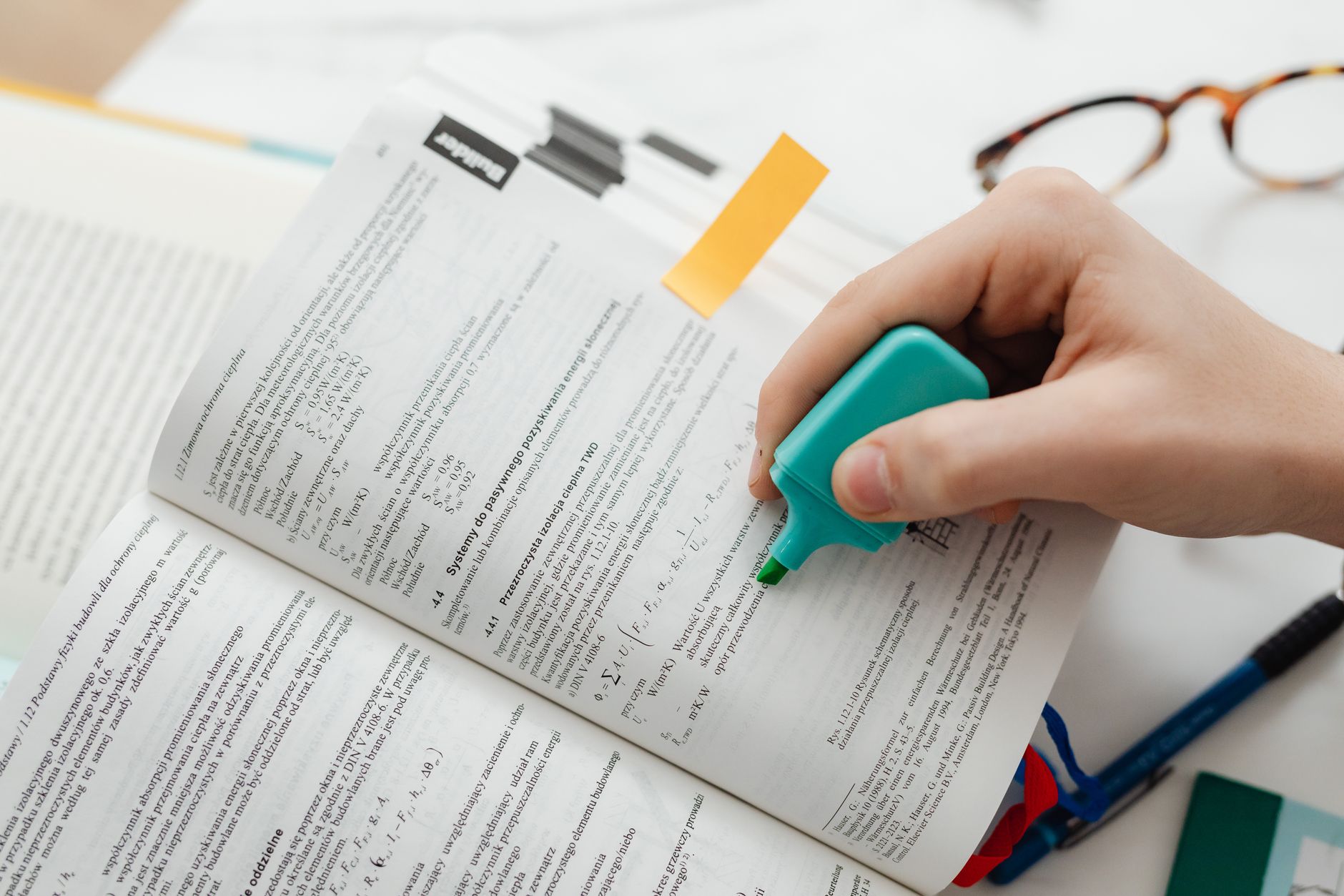A business owner editing a draft heavily before it goes out