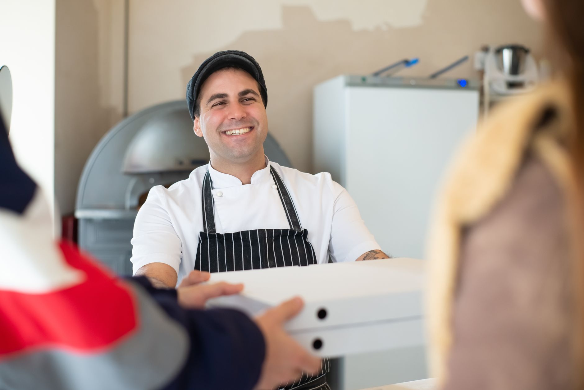 A baker serving a customer who recognised the shop instantly