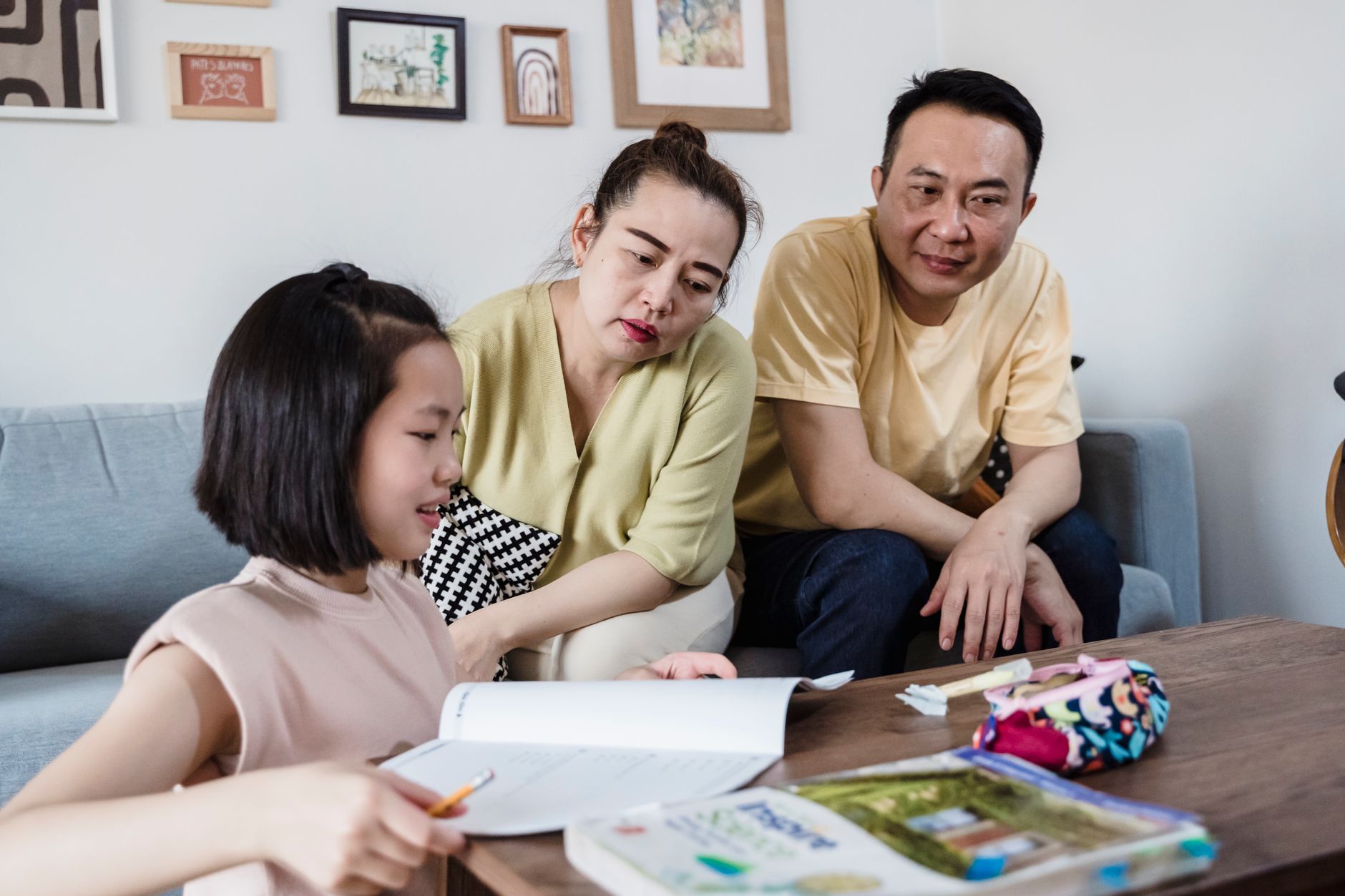 A tutor welcoming a family ahead of the new school term