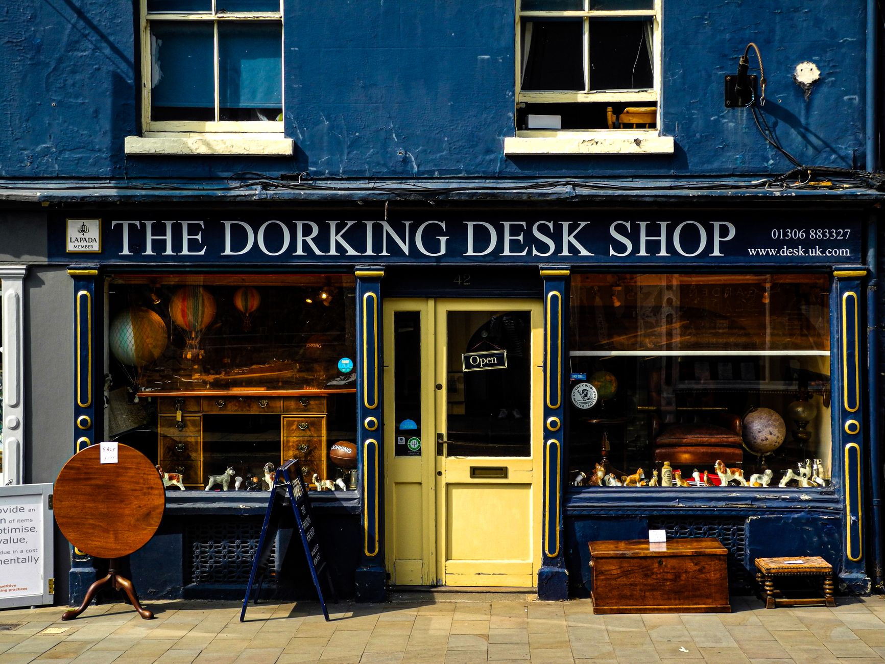 A newly opened salon shopfront on a busy UK high street