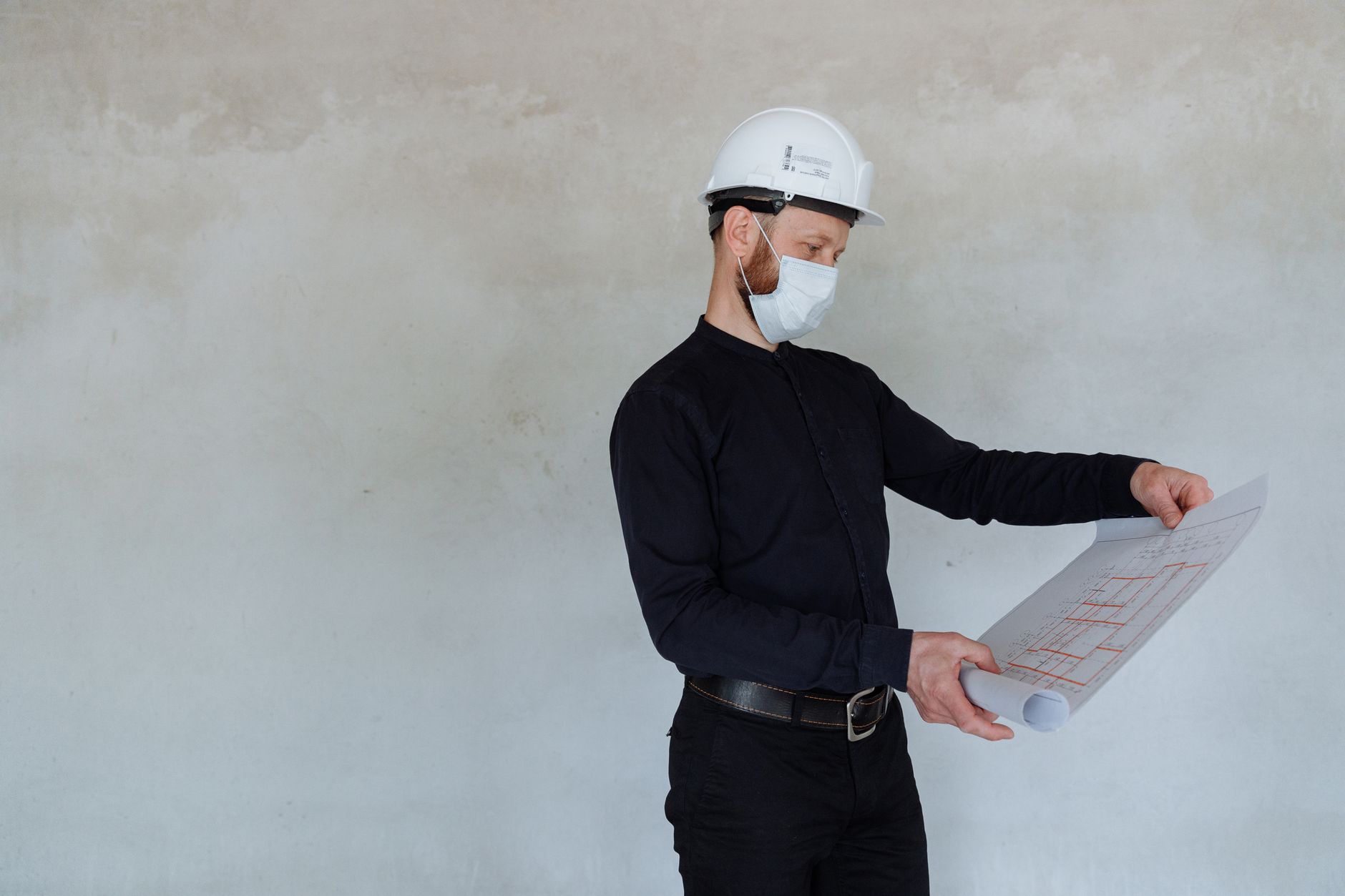 A tradesperson checking a message before it goes out to a customer