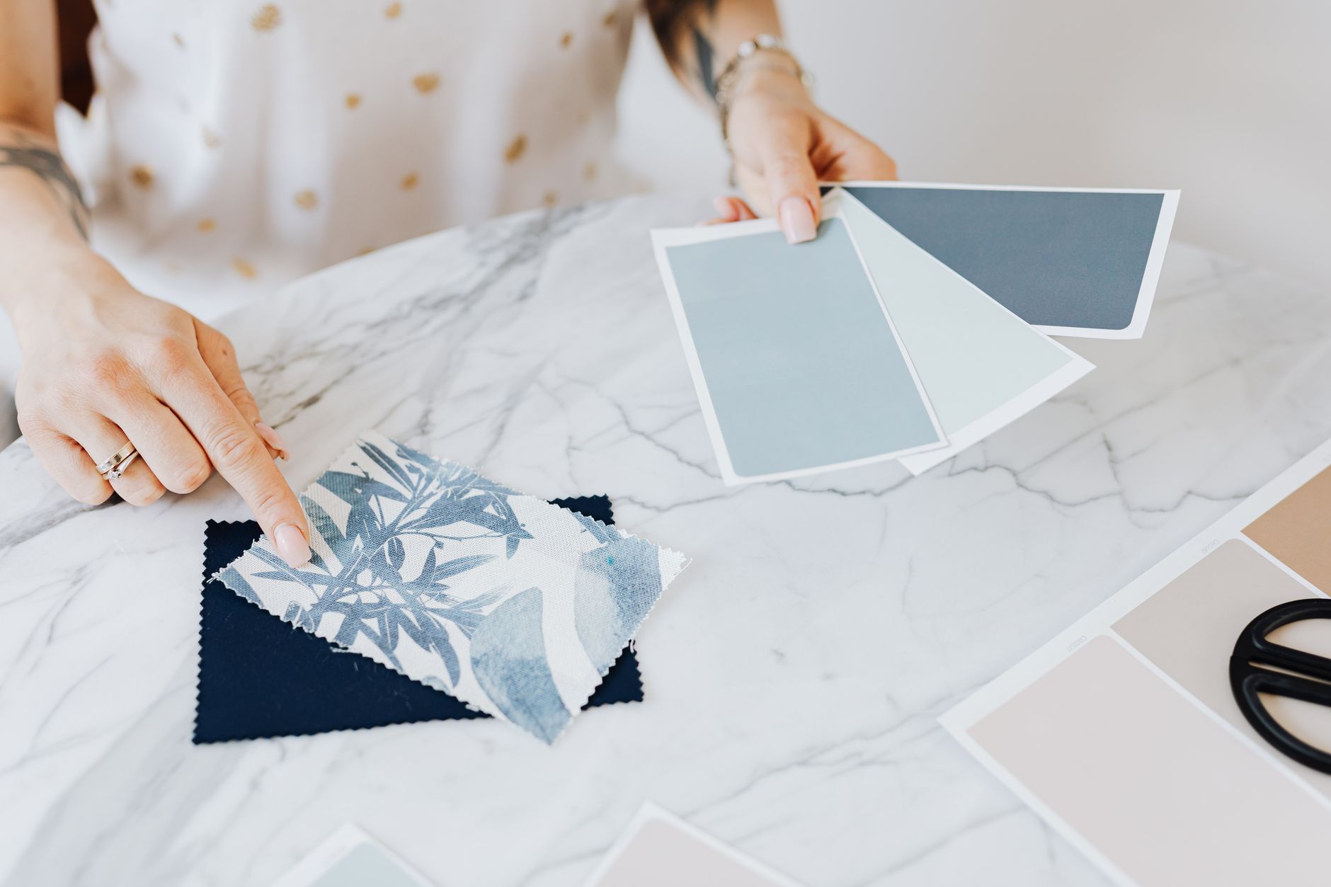 A designer laying out the typography and colour rules for a brand