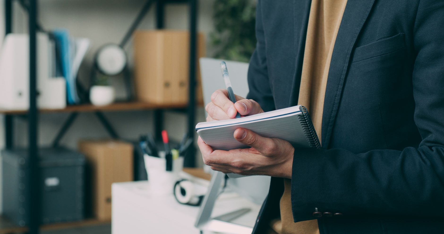 A founder working through positioning steps with pen and paper