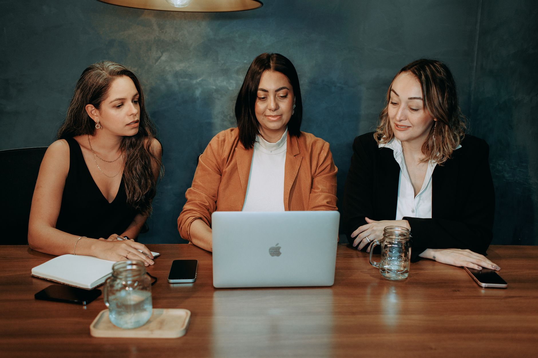 A small SaaS leadership team holding a quarterly review