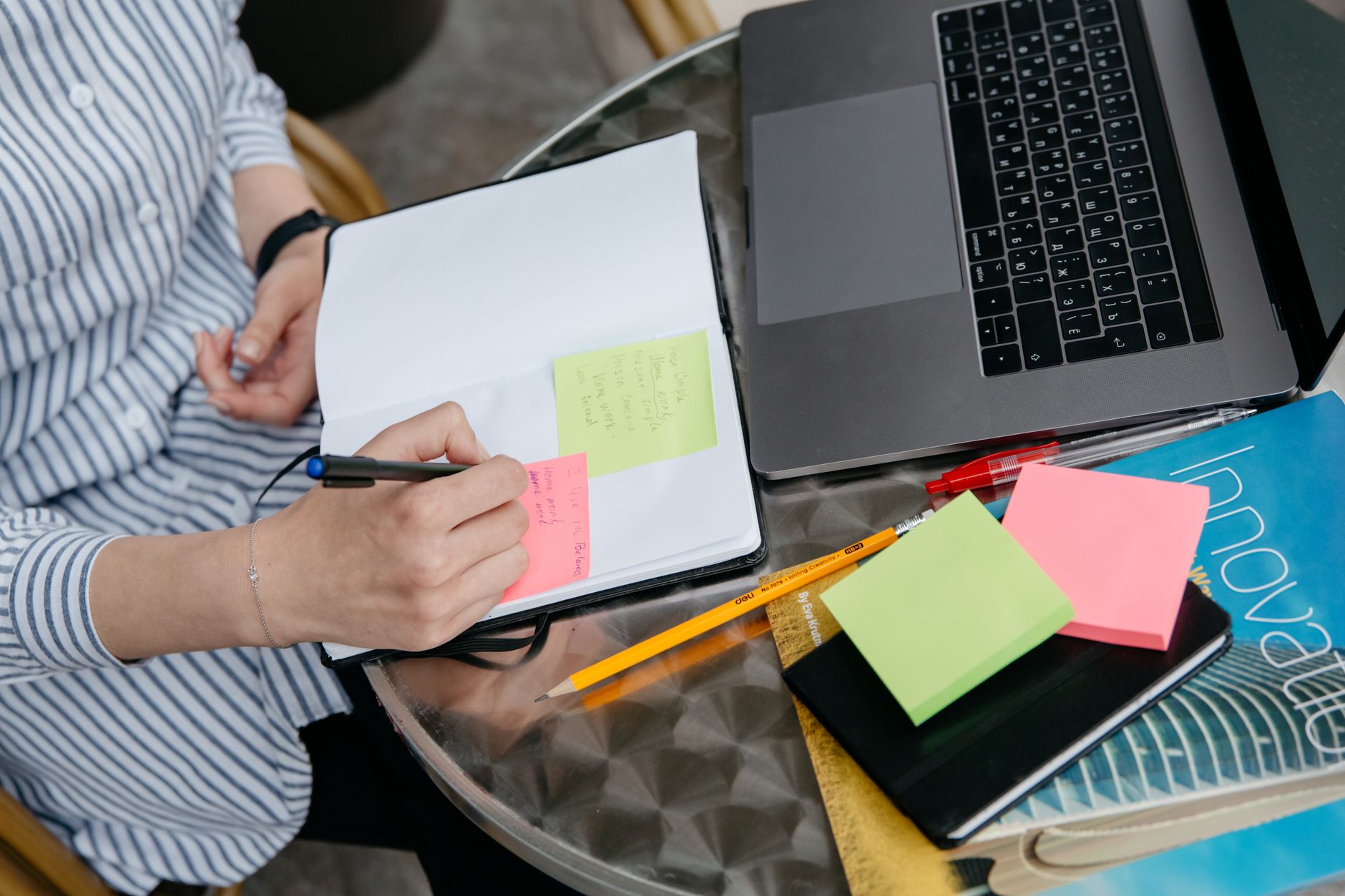 A business owner listing the parts of their brand strategy