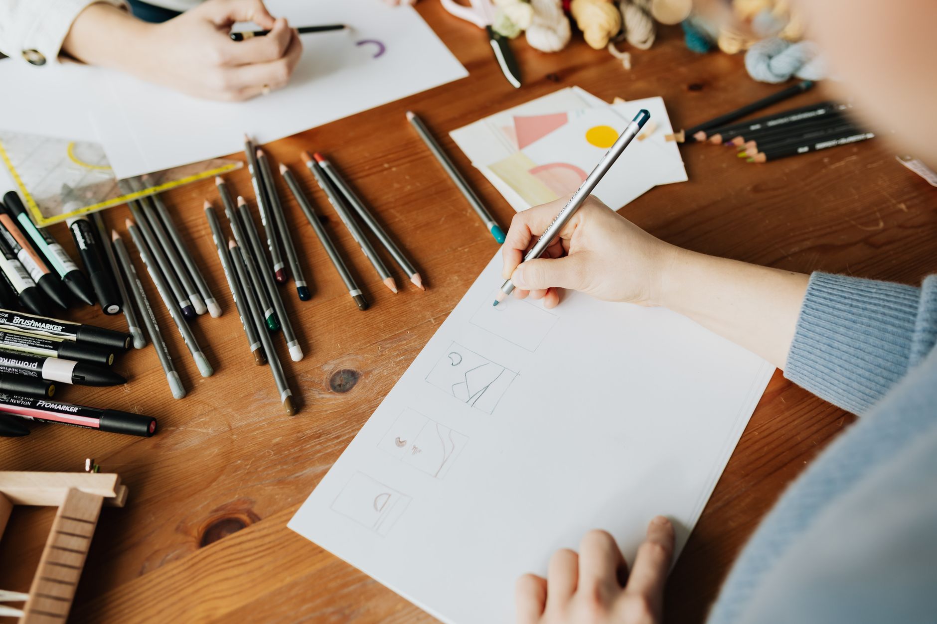 An illustrator working among other creative businesses in a shared studio