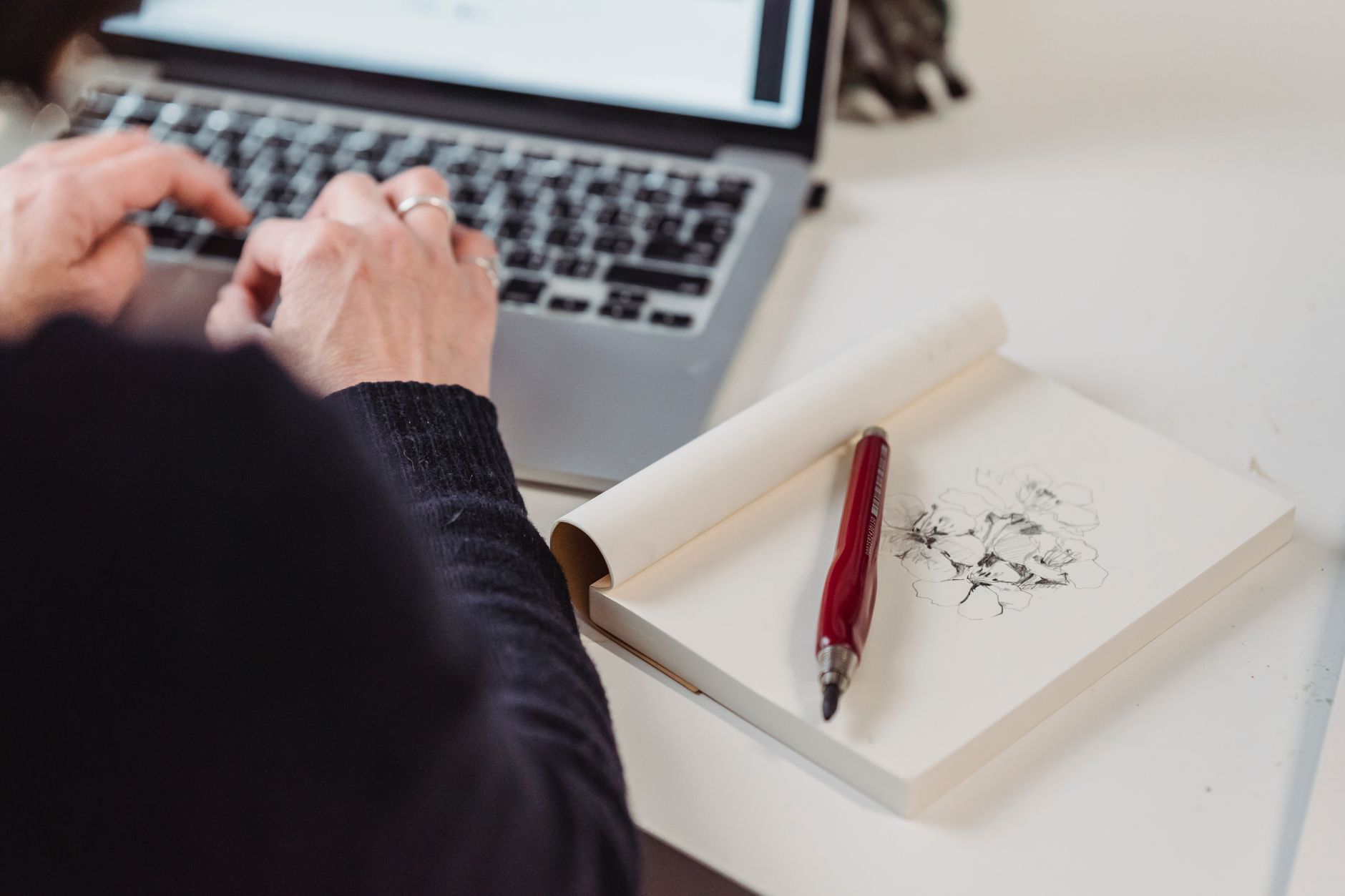 A ceramicist writing notes to define her brand voice