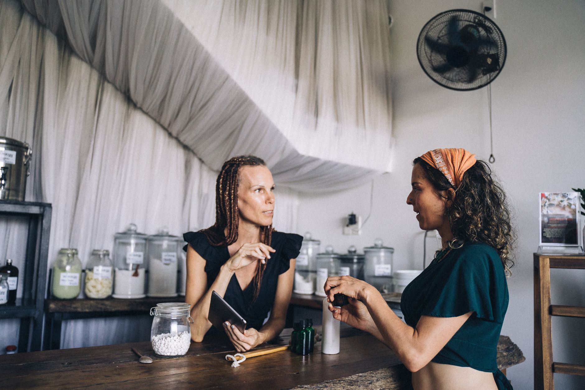 A shop owner having a genuine conversation with a customer