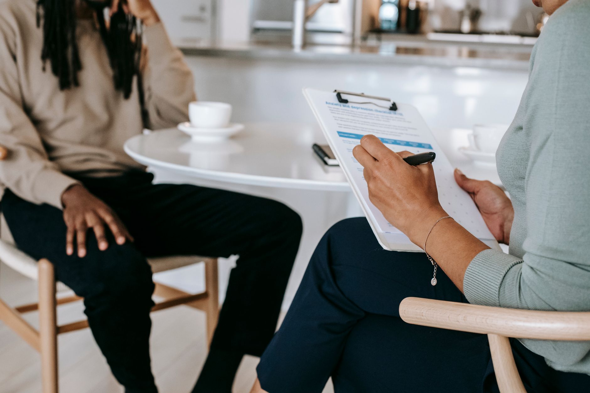 An owner interviewing a real customer to learn what drives their decisions