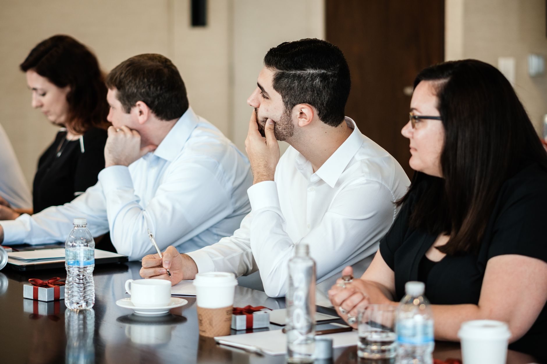 A consultant reviewing research notes before a client meeting