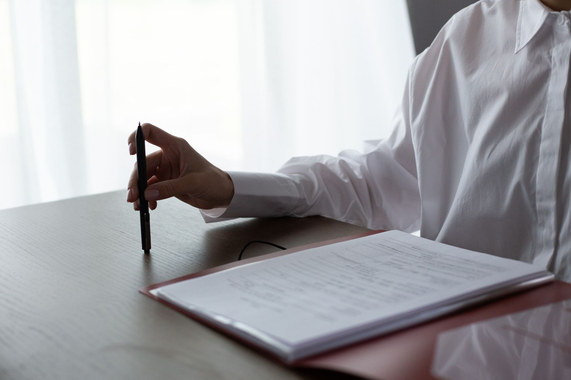 A consultant checking client confidentiality terms before using new tools