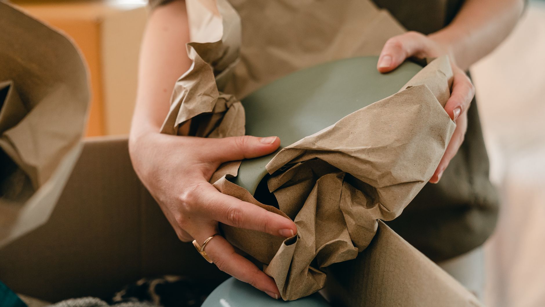 A business owner packing Christmas orders ready for the delivery deadline