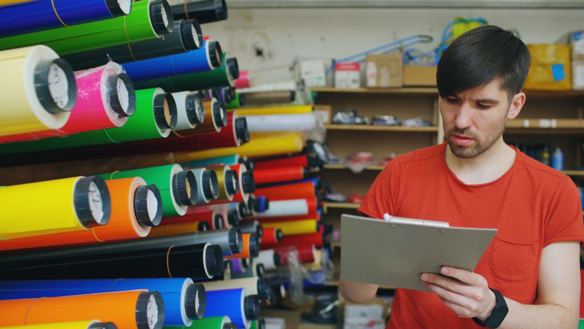 A retail owner checking stock ahead of the busy Christmas trading period