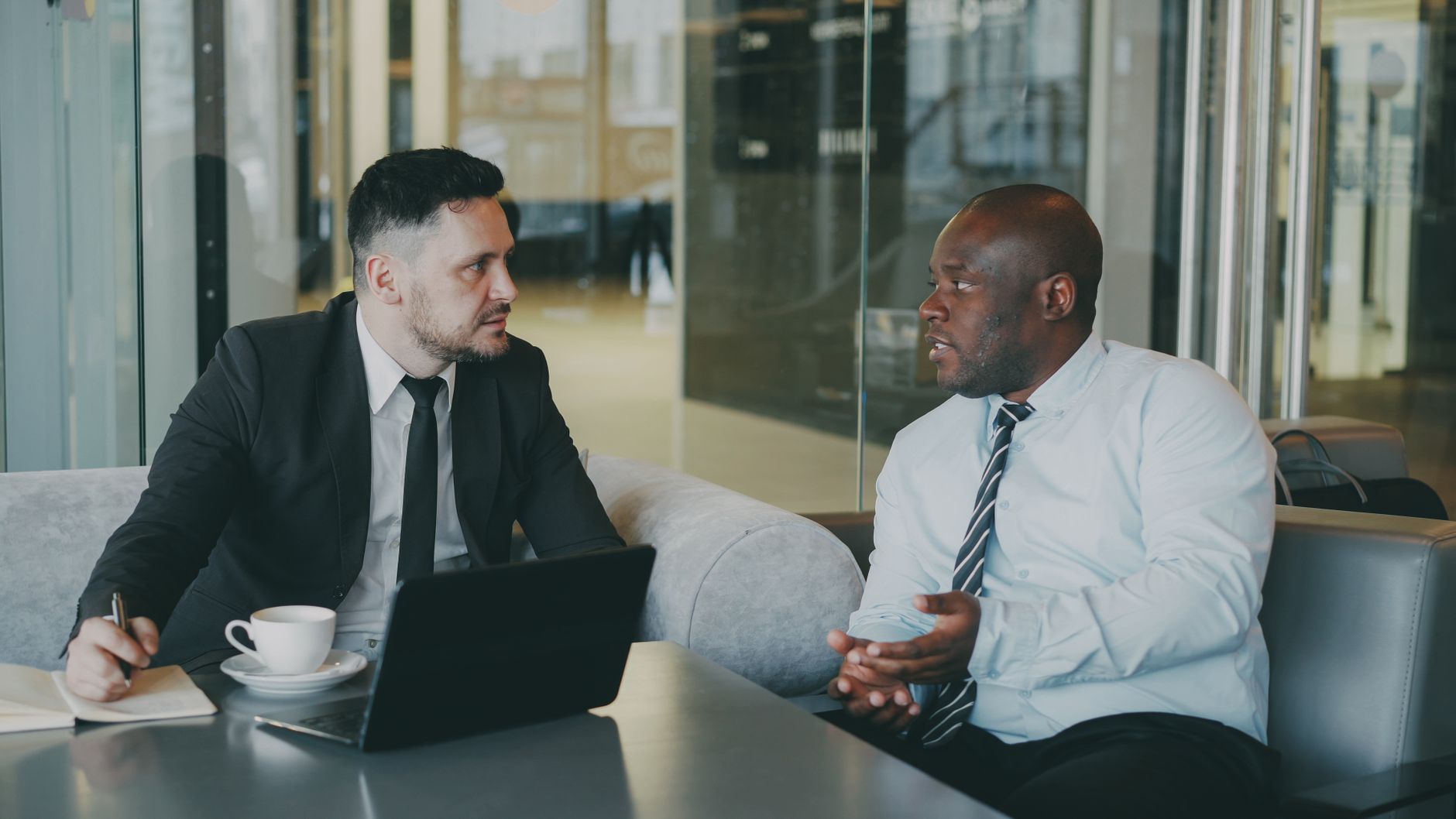 A consultant listening to a small business owner describe a problem