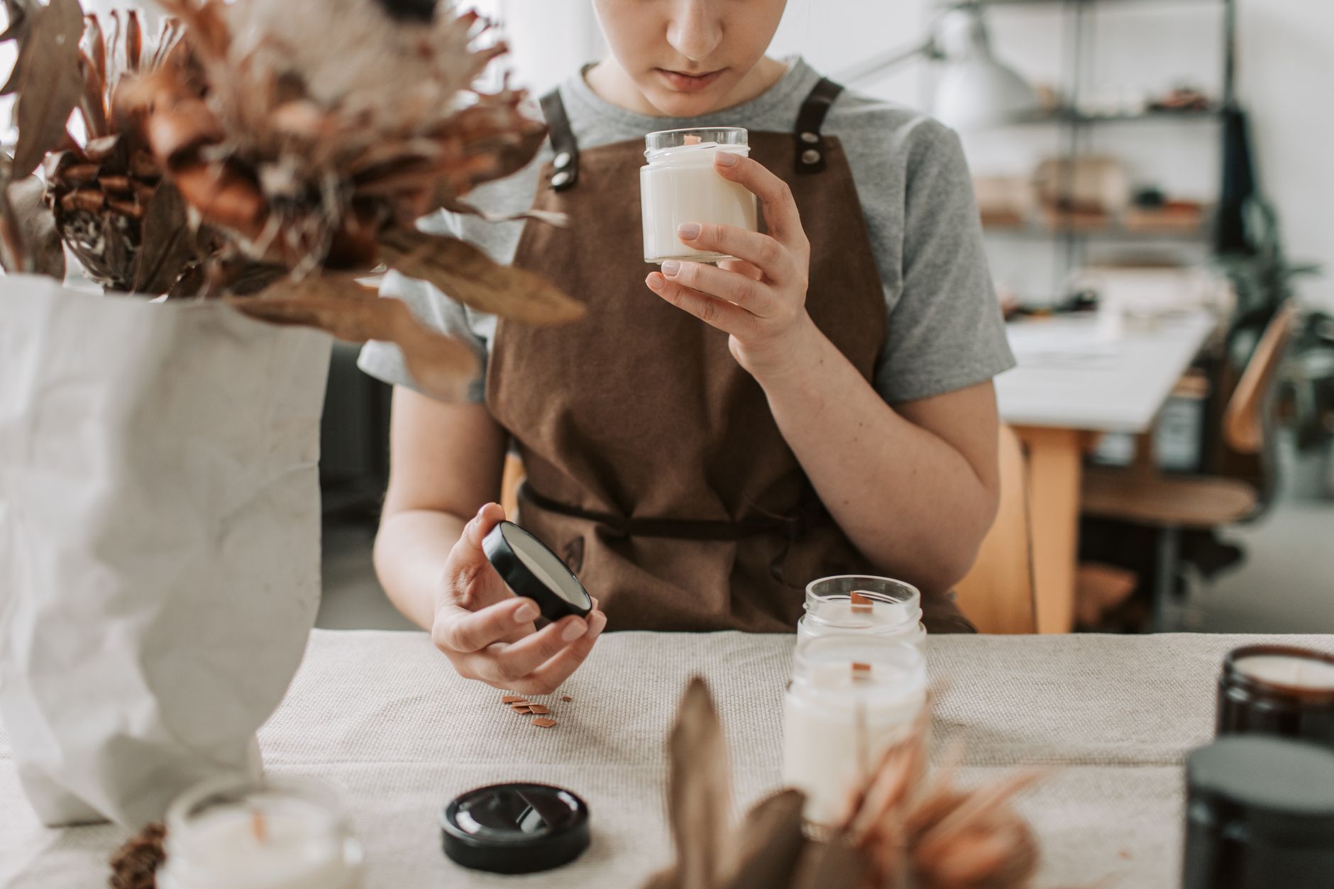 A small business owner photographing products for their online shop