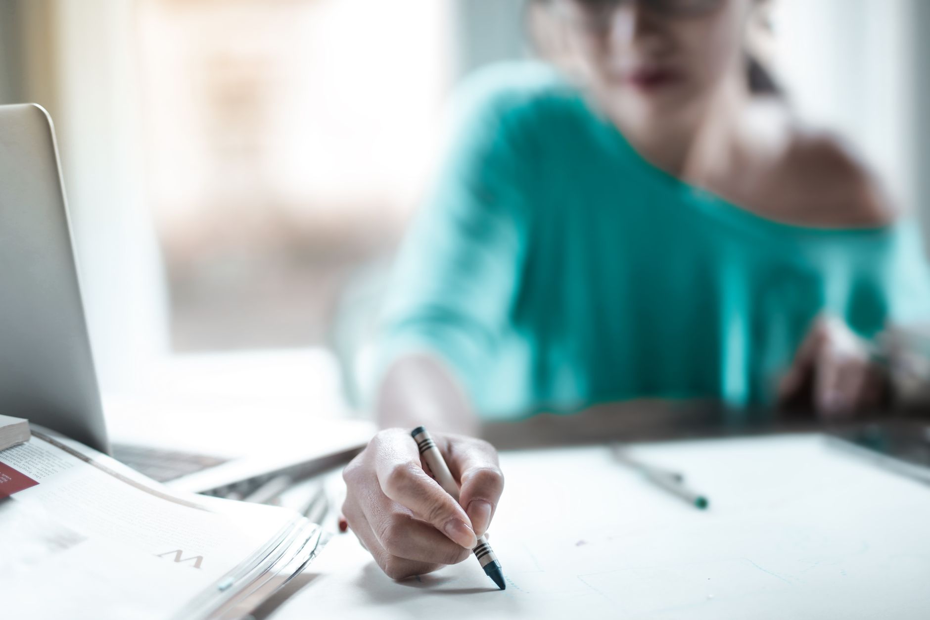 A business owner mapping out three pricing tiers for a course
