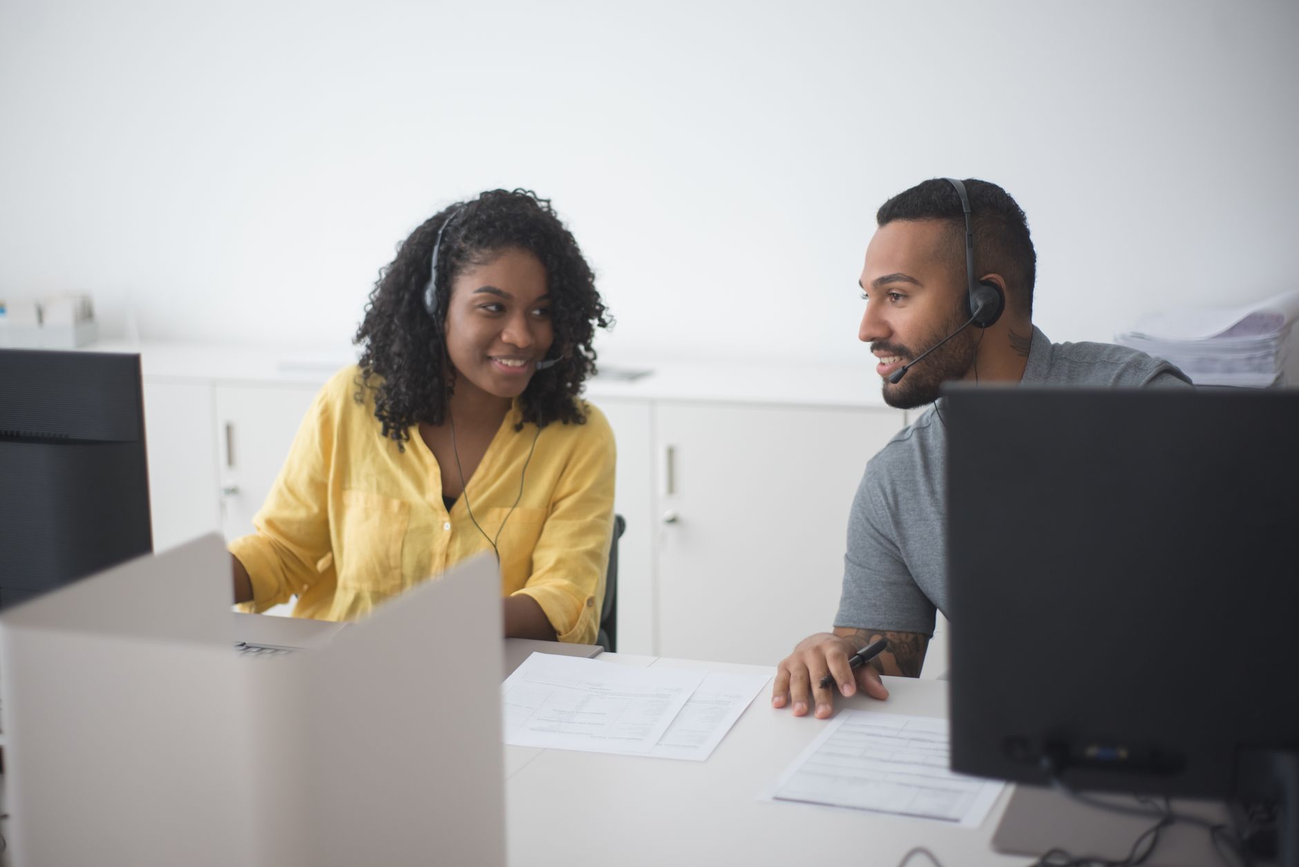 A customer support colleague helping a client on a call