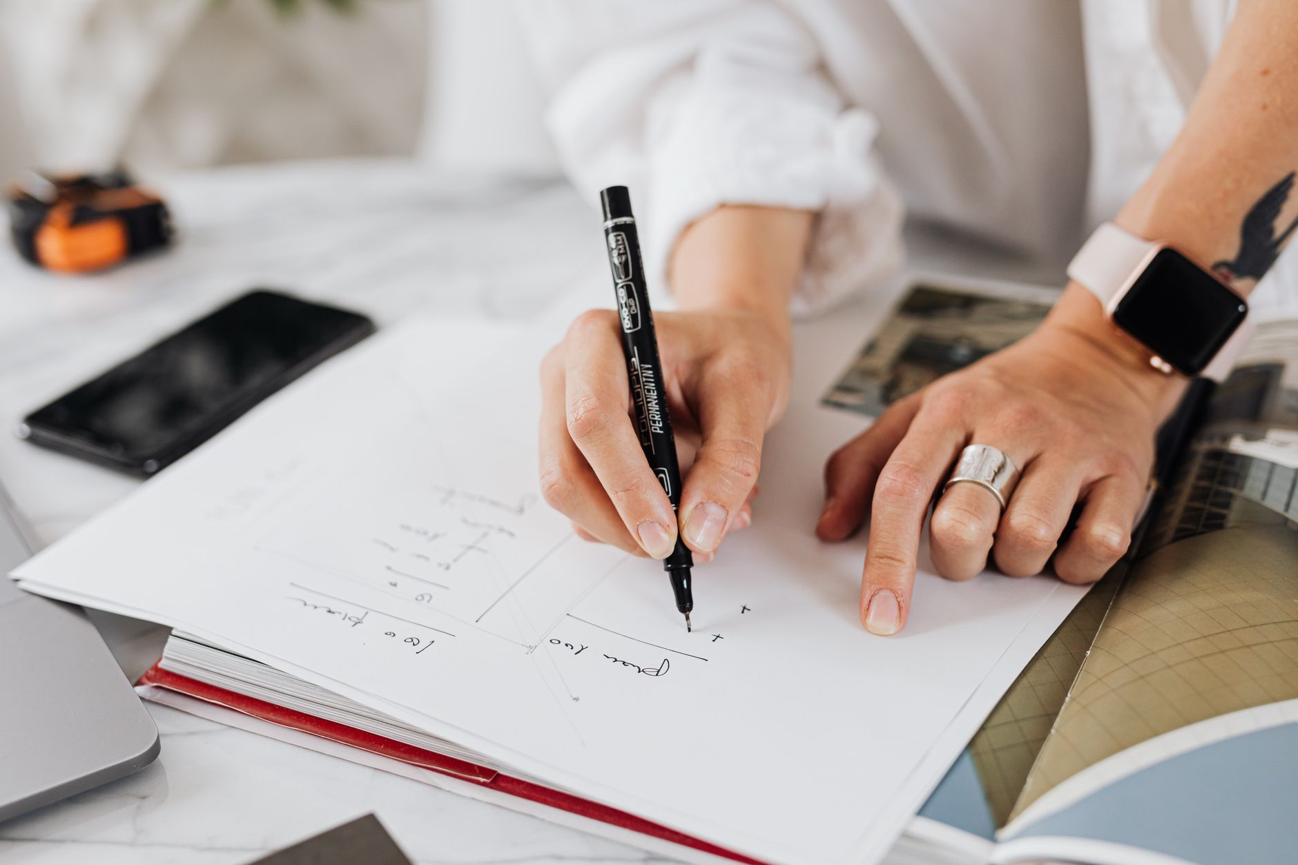 A small business owner mapping out how customers find and choose them