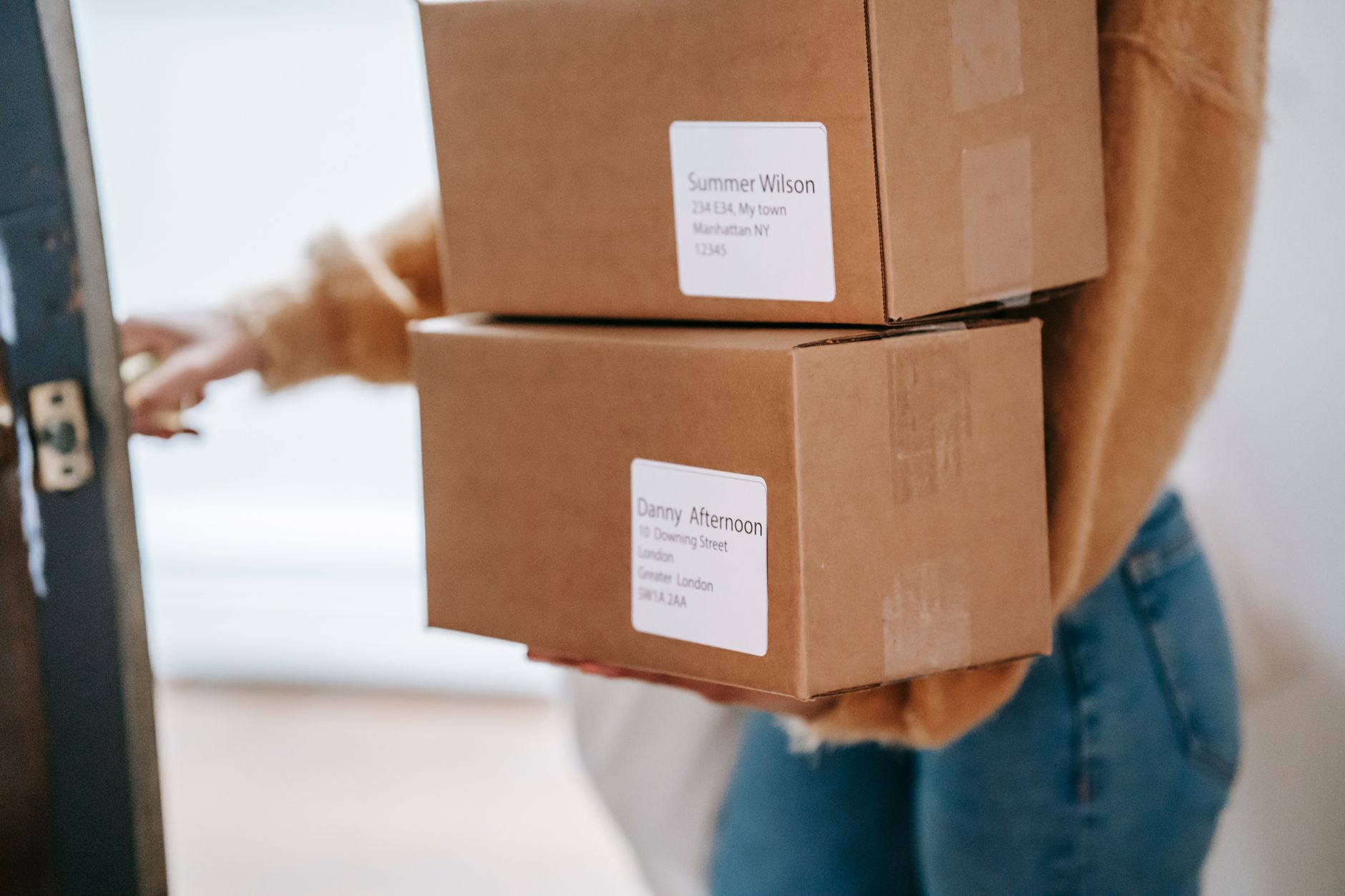 A customer receiving a parcel from an online shop she has ordered from before