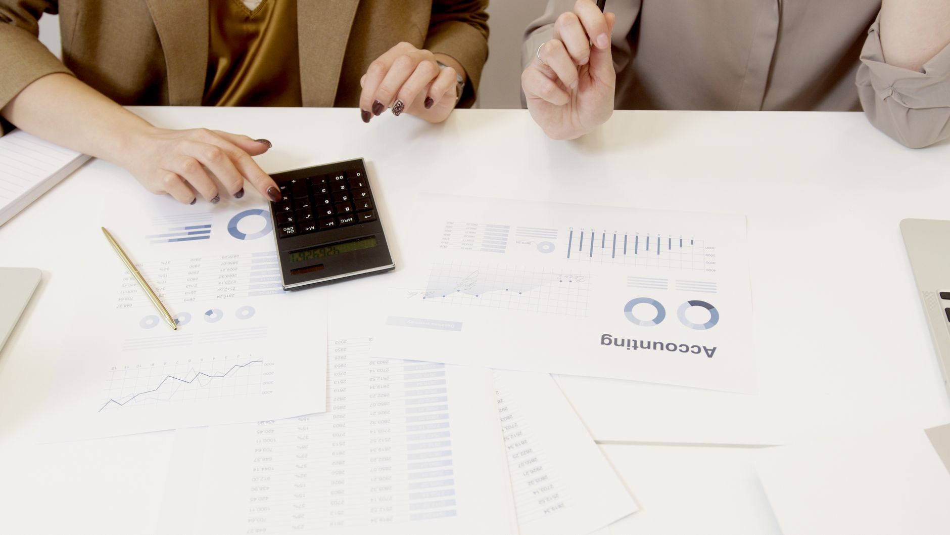 A small business owner checking repeat purchase numbers