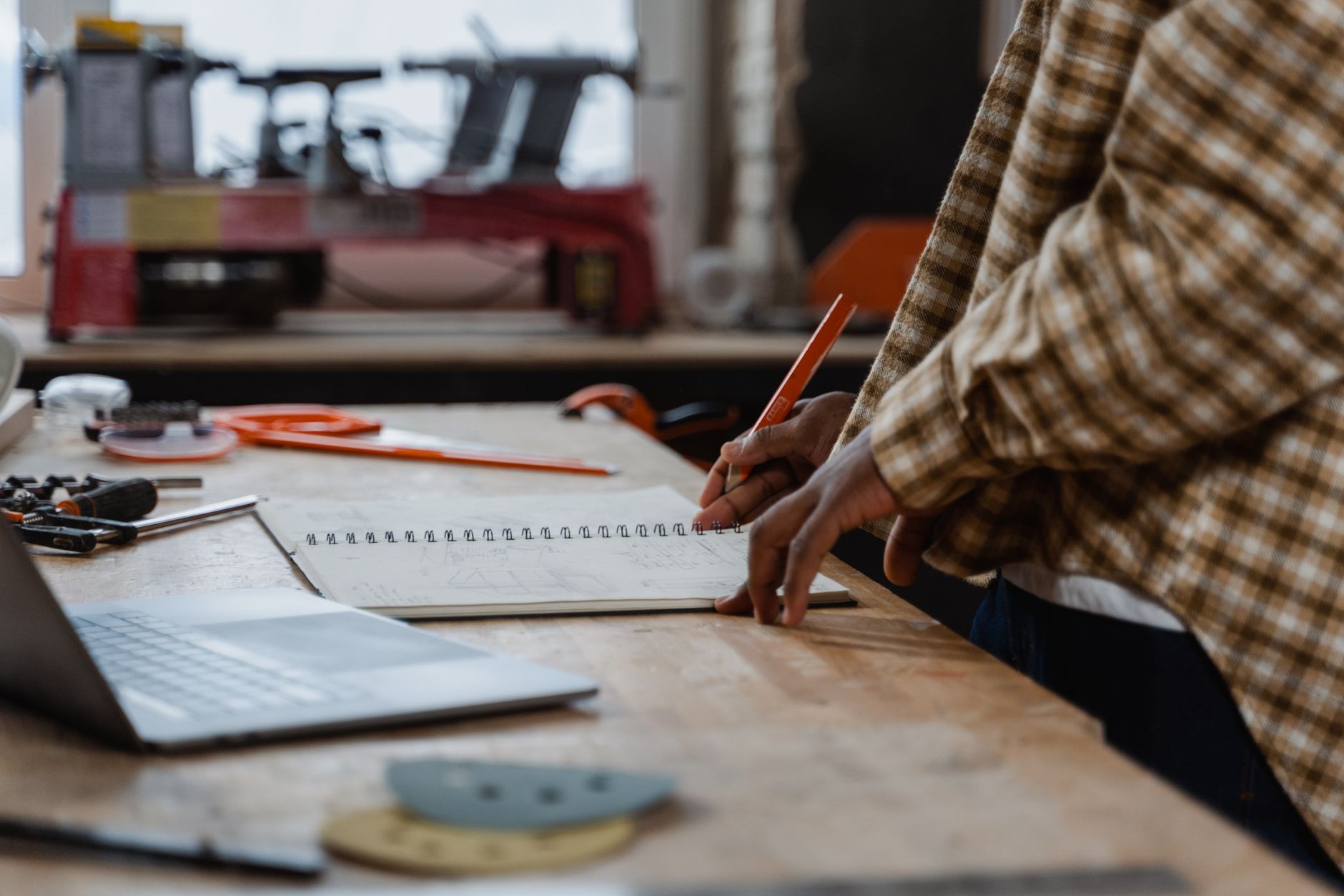 An online shop owner working through a marketing plan step by step