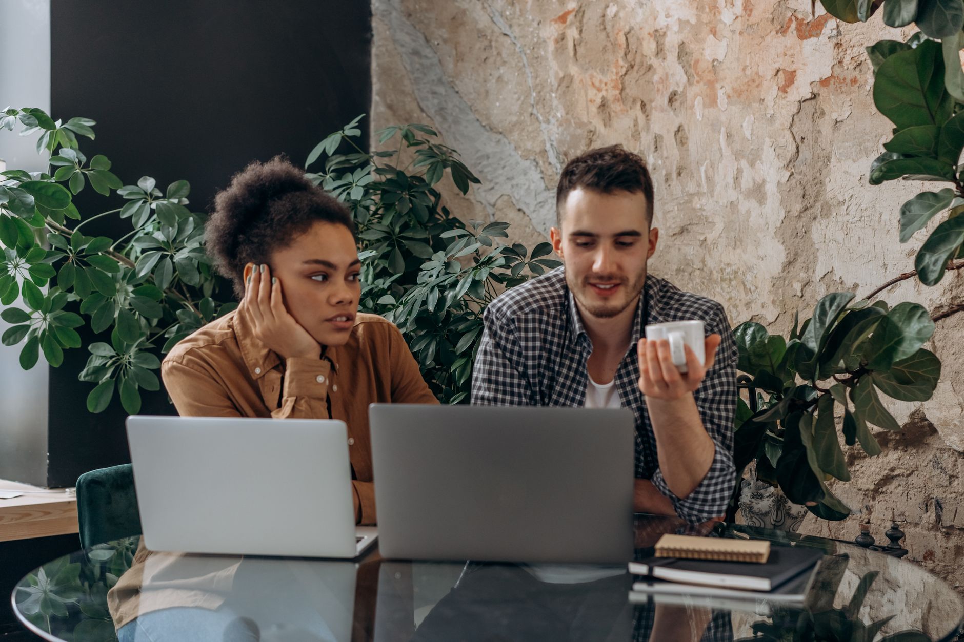 Two people discussing the difference between a page and a group