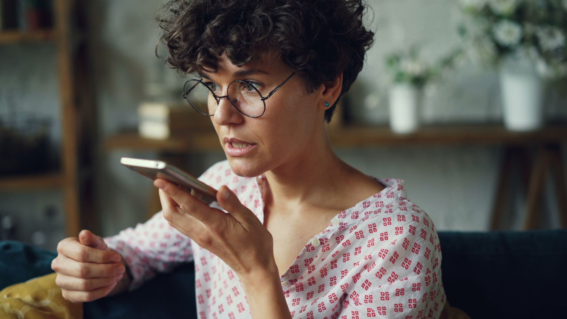A shopper asking a voice assistant a question about an online order