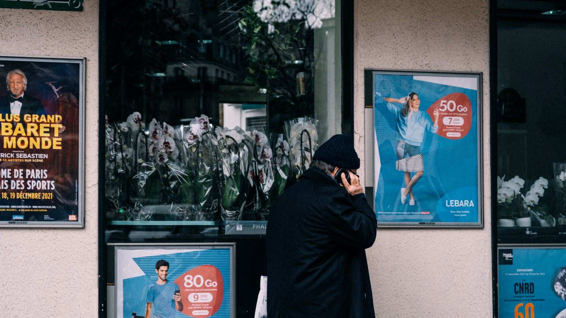 A shopper weighing up local businesses before deciding