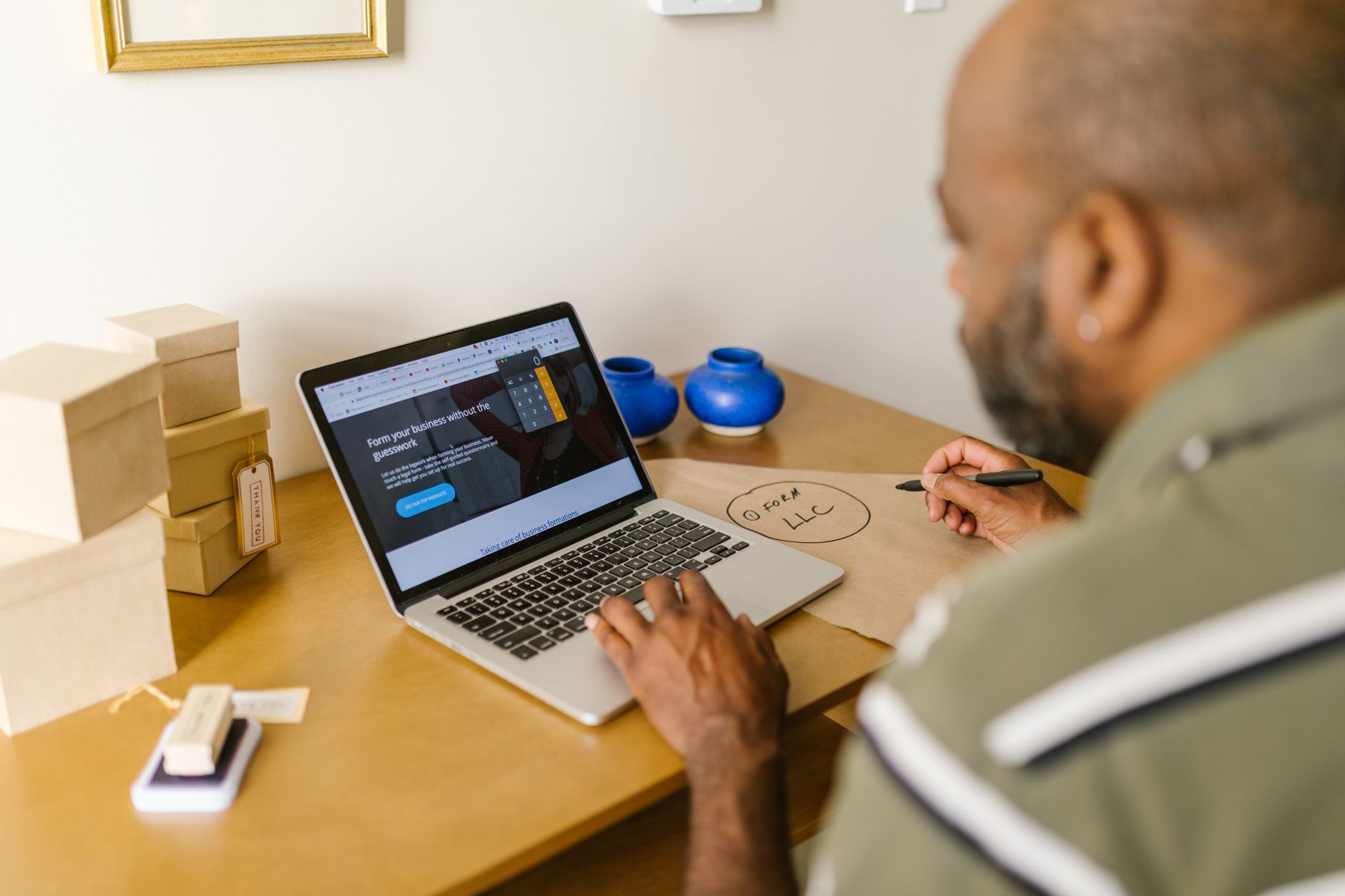 A small business owner reviewing how their business is described online