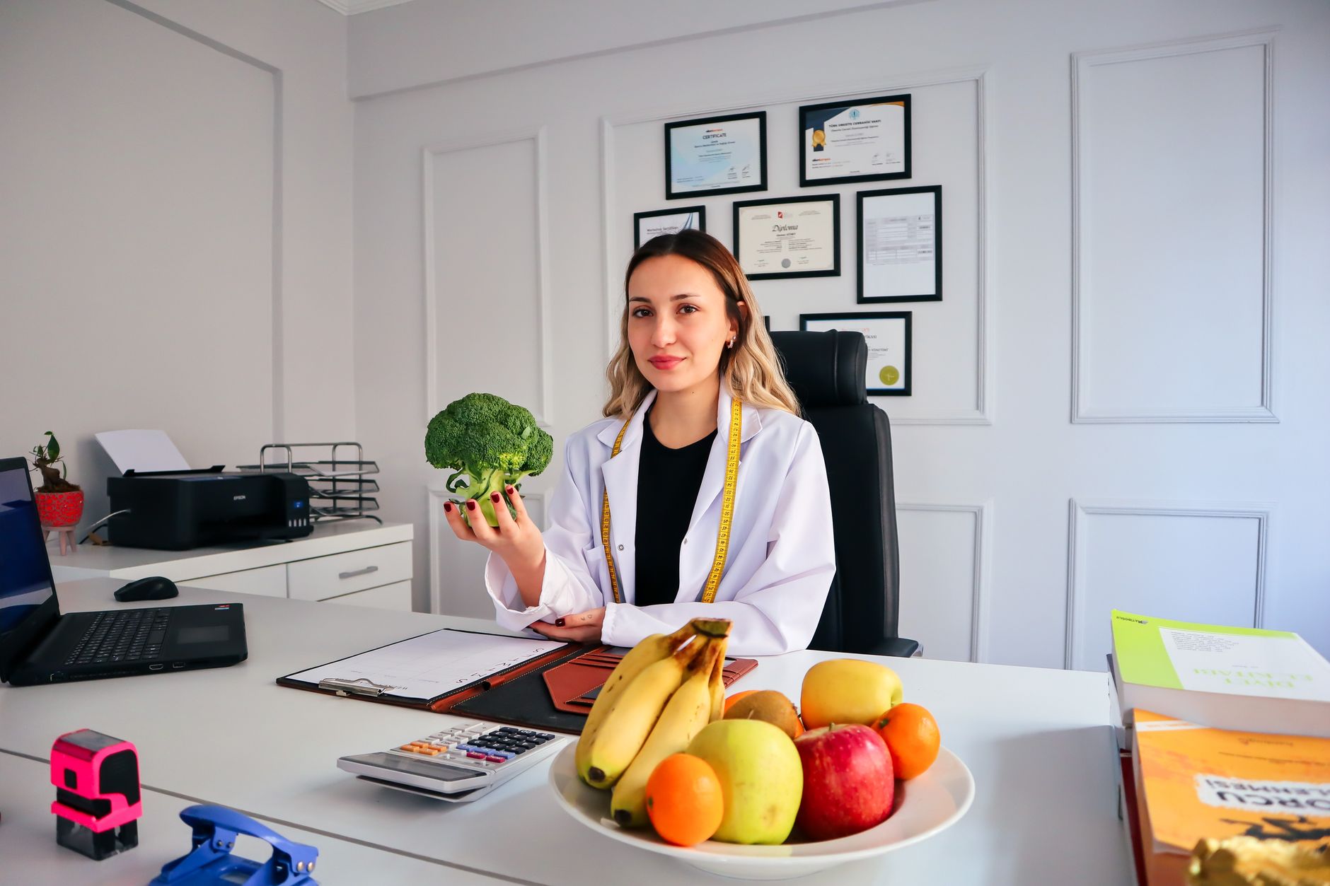 A nutritionist welcoming a new client to a first appointment