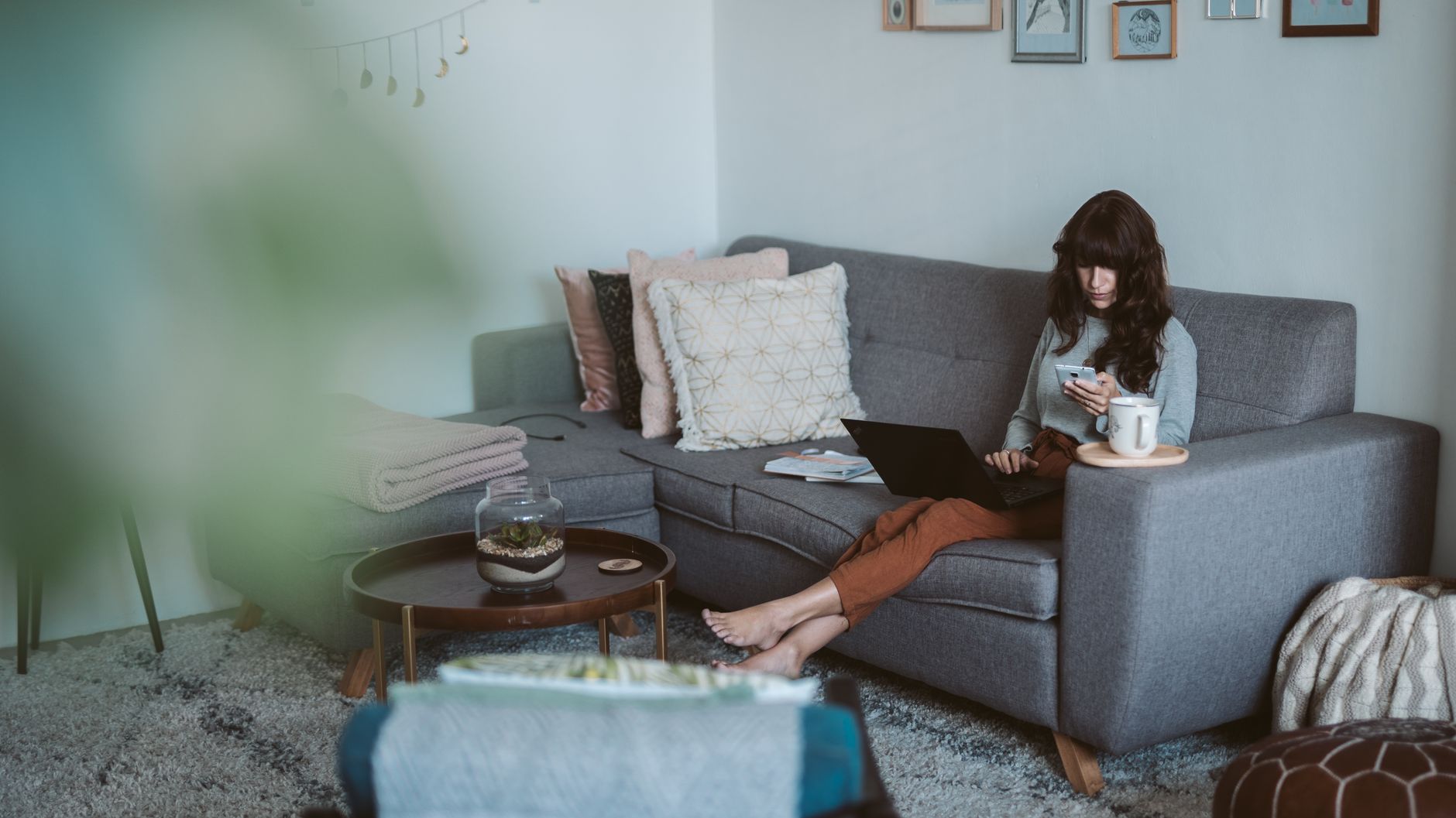 A client booking a wellbeing appointment from home on their phone