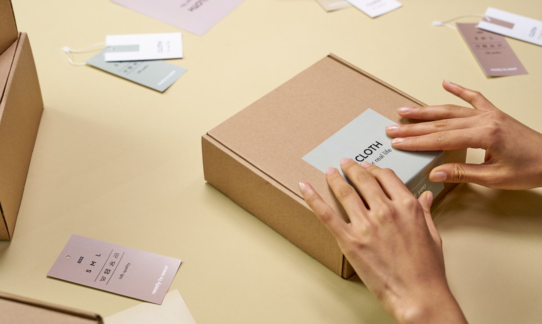 A seller adding consistent branded packaging to an online order
