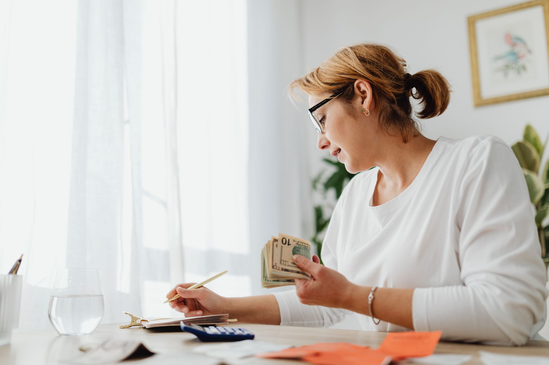 A business owner planning how to split spend between brand and promotions