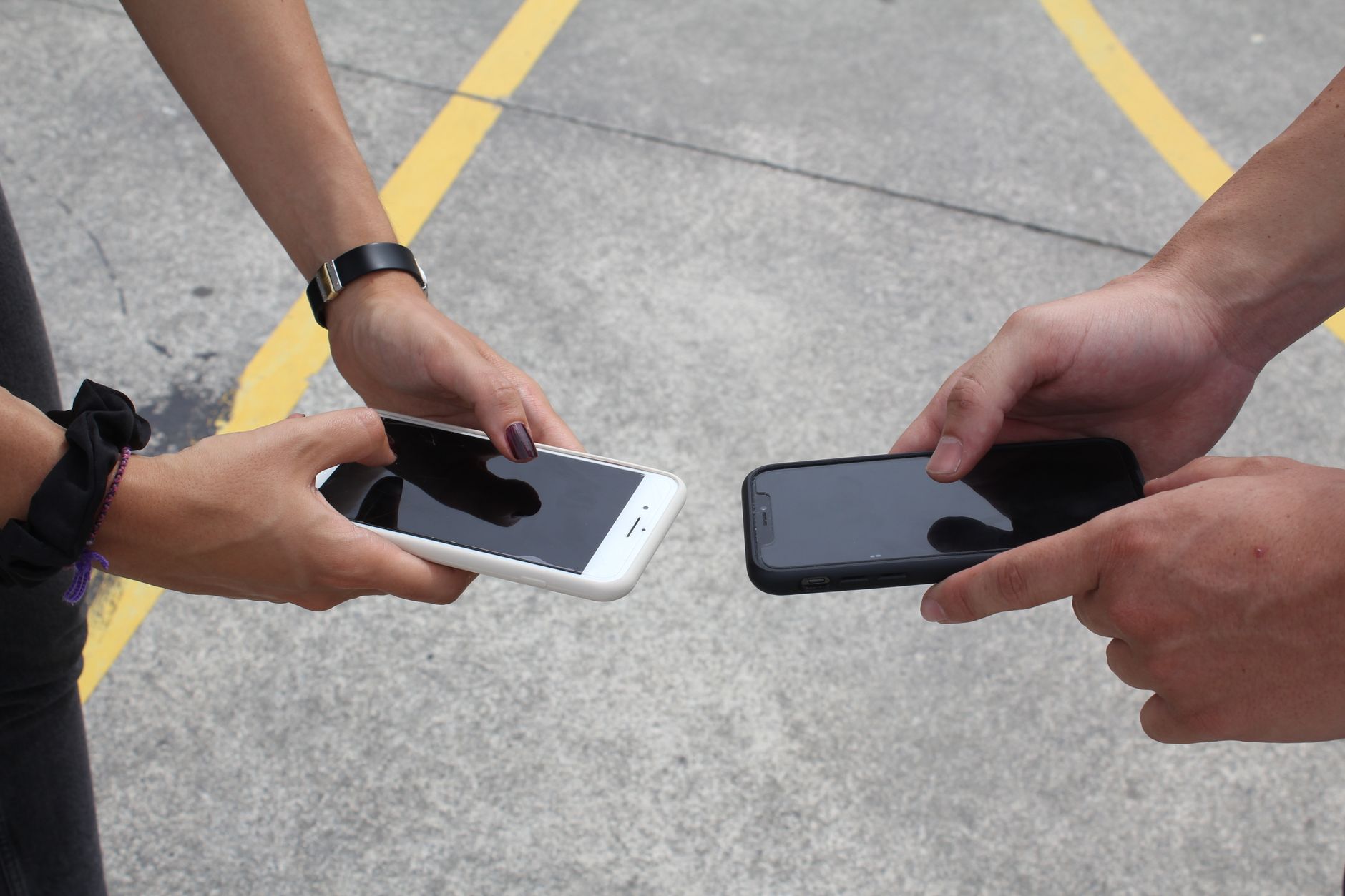 Two shoppers comparing products before making an online purchase