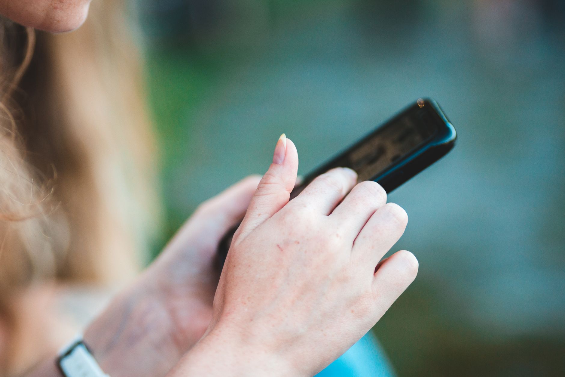 A new user follows a clean onboarding screen on their phone, tapping through a short first-run flow toward the app's main feature.