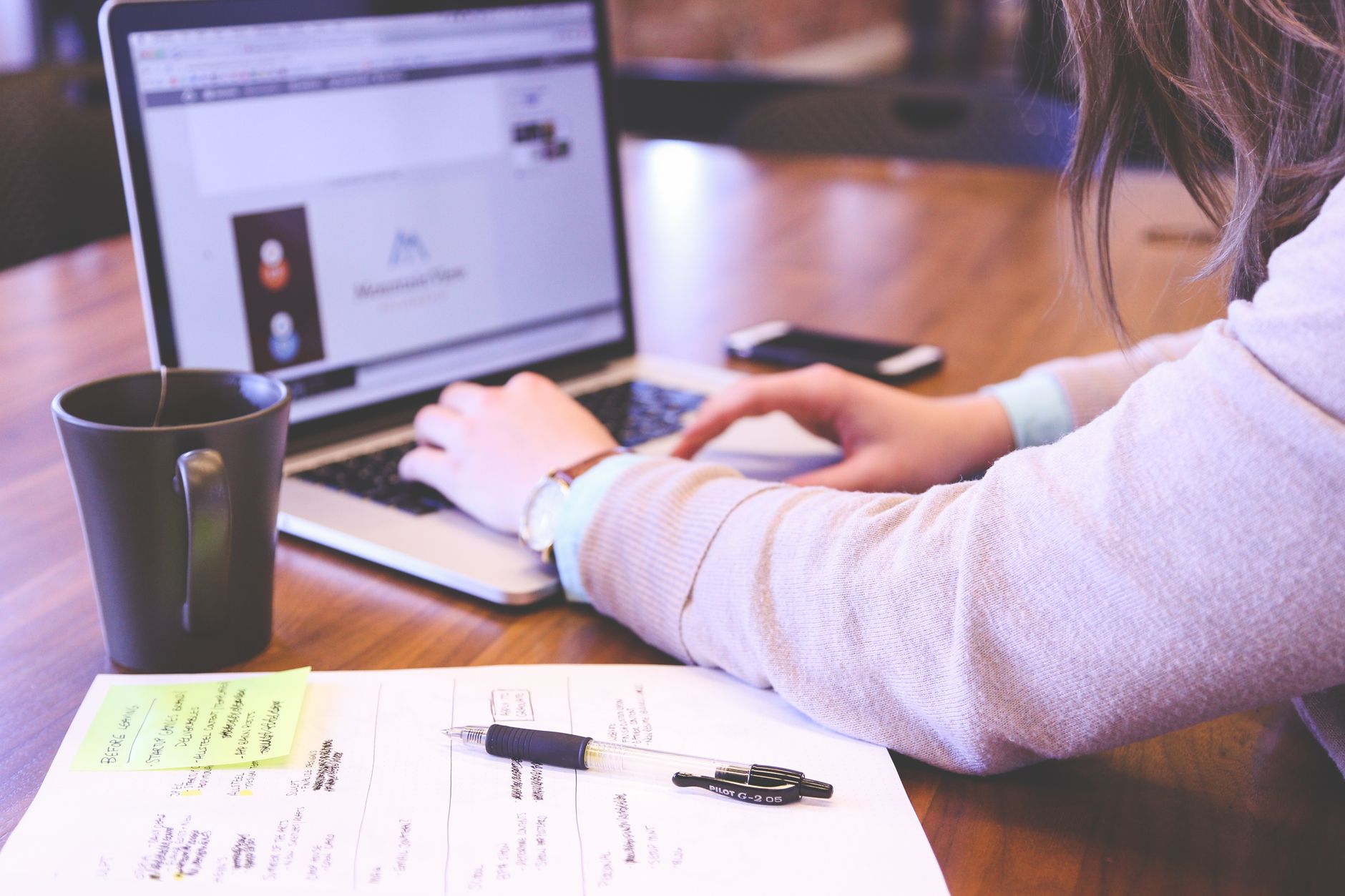 A small business owner writing the first post for their blog