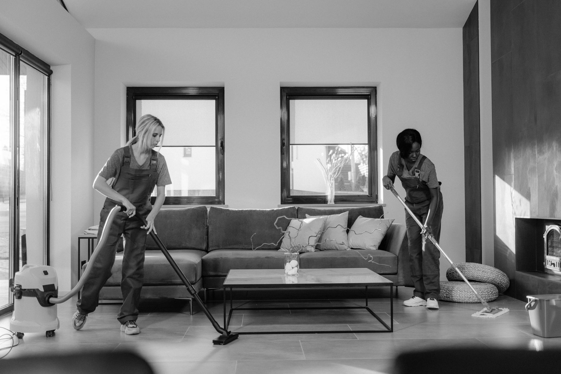 A cleaner working in a tidy living room, the domestic niche that suits a new cleaning business